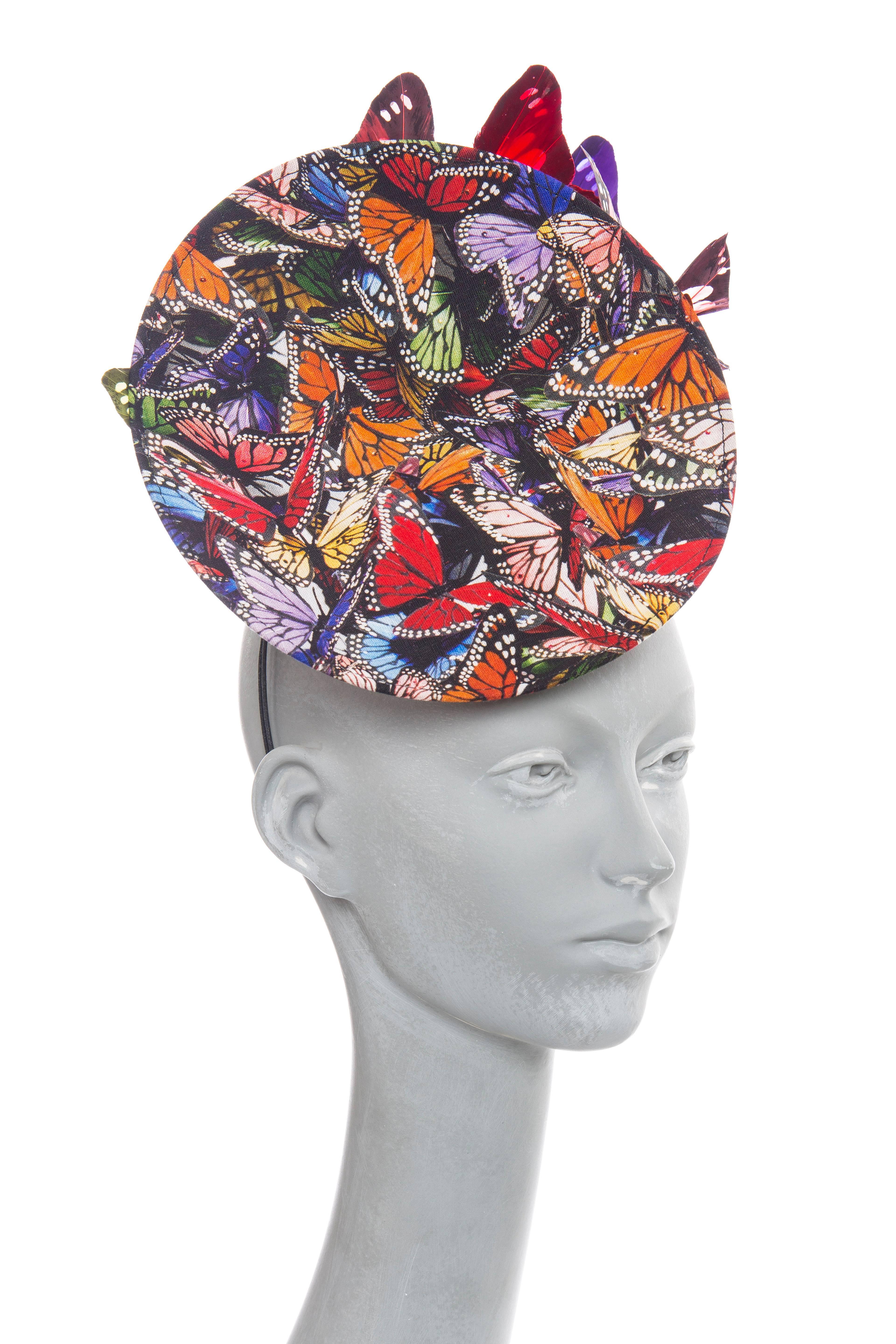 Philip Treacy, circa 2003, wired polychrome fascinator with hat box autographed by the milliner.

