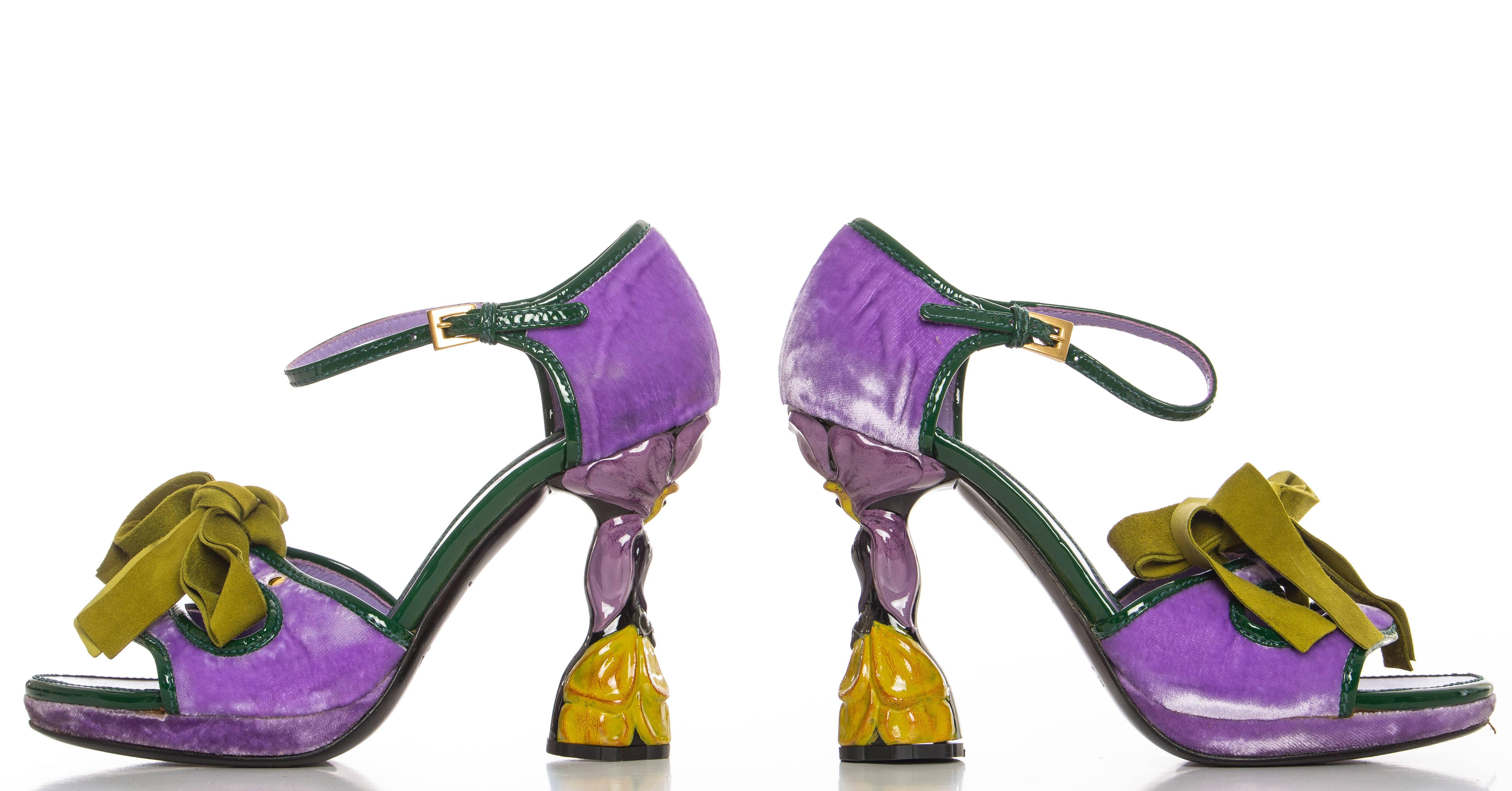  Prada, Spring - Summer 2008,  purple velvet sandals with green patent leather trim and piping, sculptural floral heels, green suede bow accent at front and buckle closure at ankles. Includes box and dust bag.

Eu 36.5
US 6.5

Heels 4