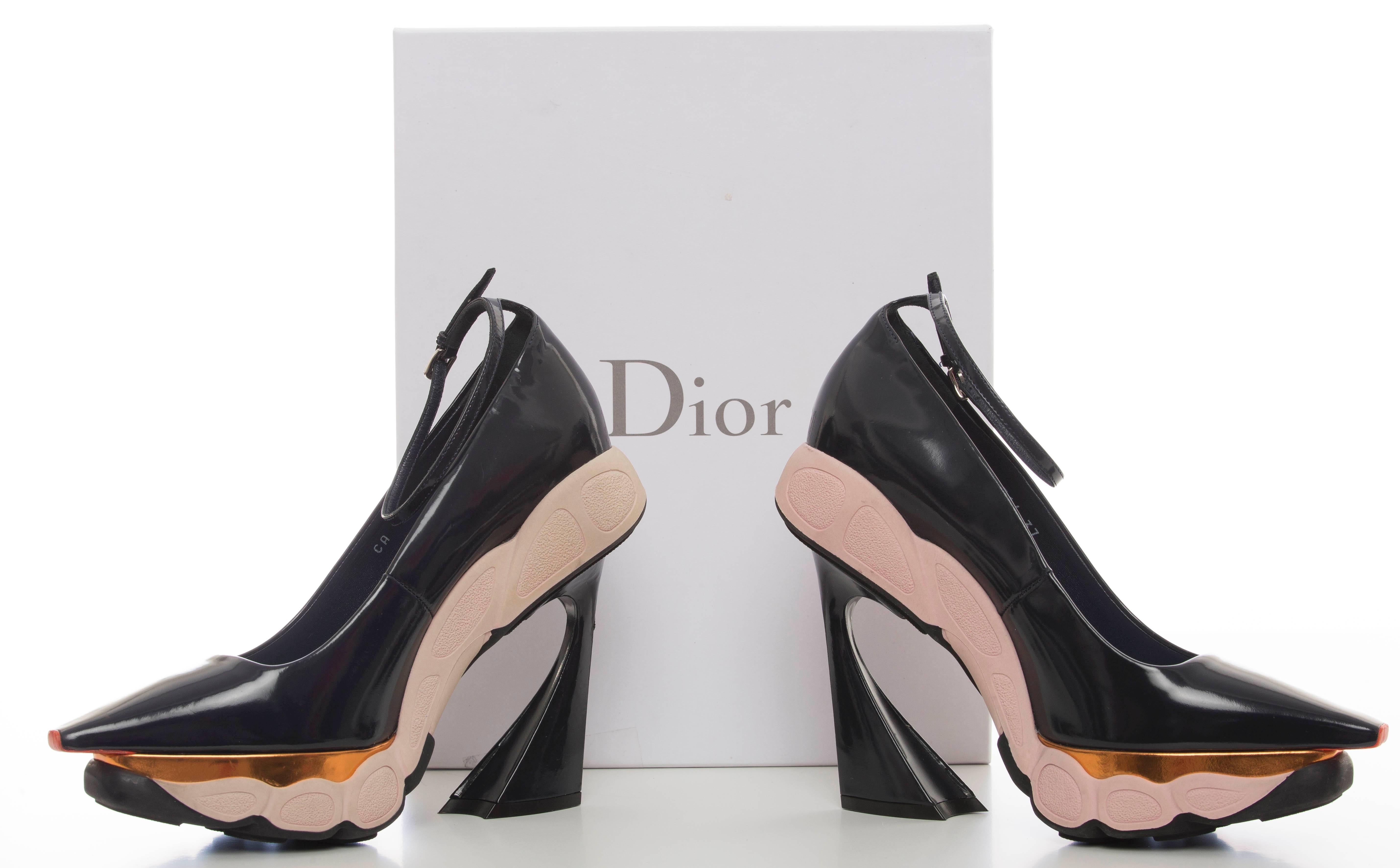 Christian Dior by Raf Simons, Fall 2014, navy blue, patent leather, pointed-toe runway sneaker pumps with orange metallic leather accents, rubber soles, covered heels with ankle straps. Includes box.

IT 37
US 7

Heels 5.5