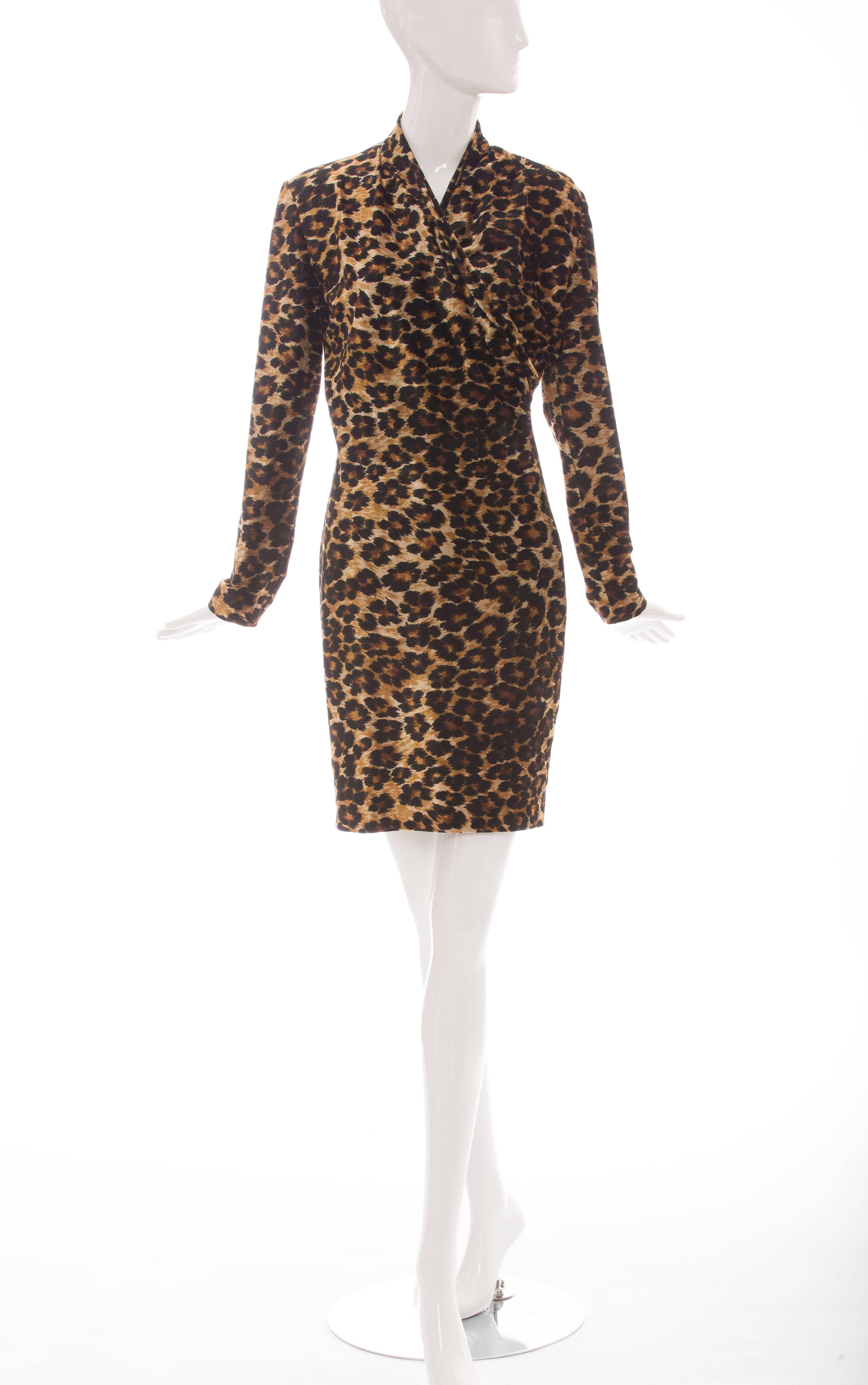 Patrick Kelly, circa: 1980's, stretch velour, leopard print wrap dress with invisible  back zip.

FR. 40
US. 8