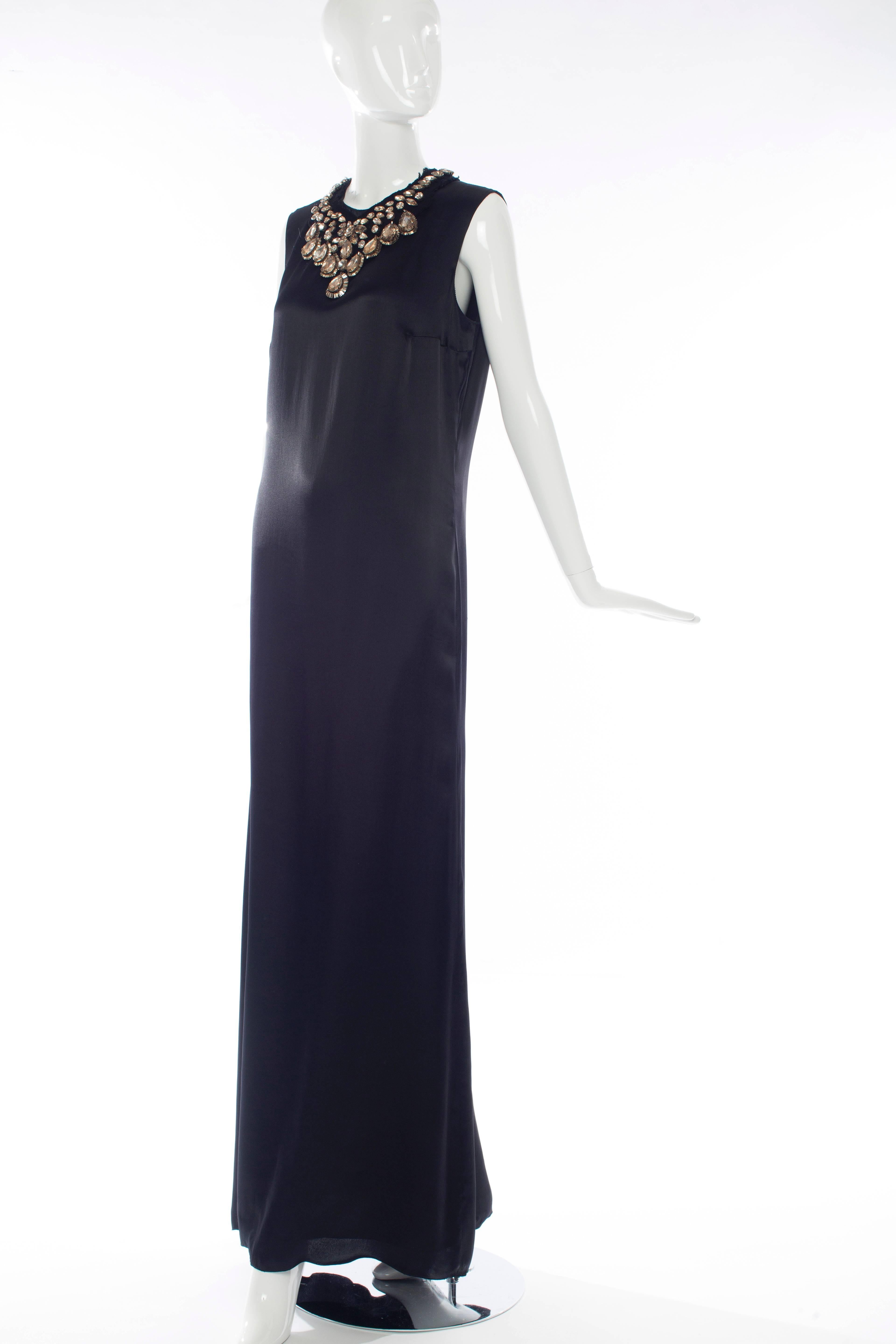 Alber Elbaz for Lanvin, Fall 2007 sleeveless black viscose silk long evening dress with prong-set crystal neckline, concealed back zip and hook and eye closure, fully lined in silk.

FR. 42
US.10

Bust, 38, Waist 36, Hips 42, Length 61