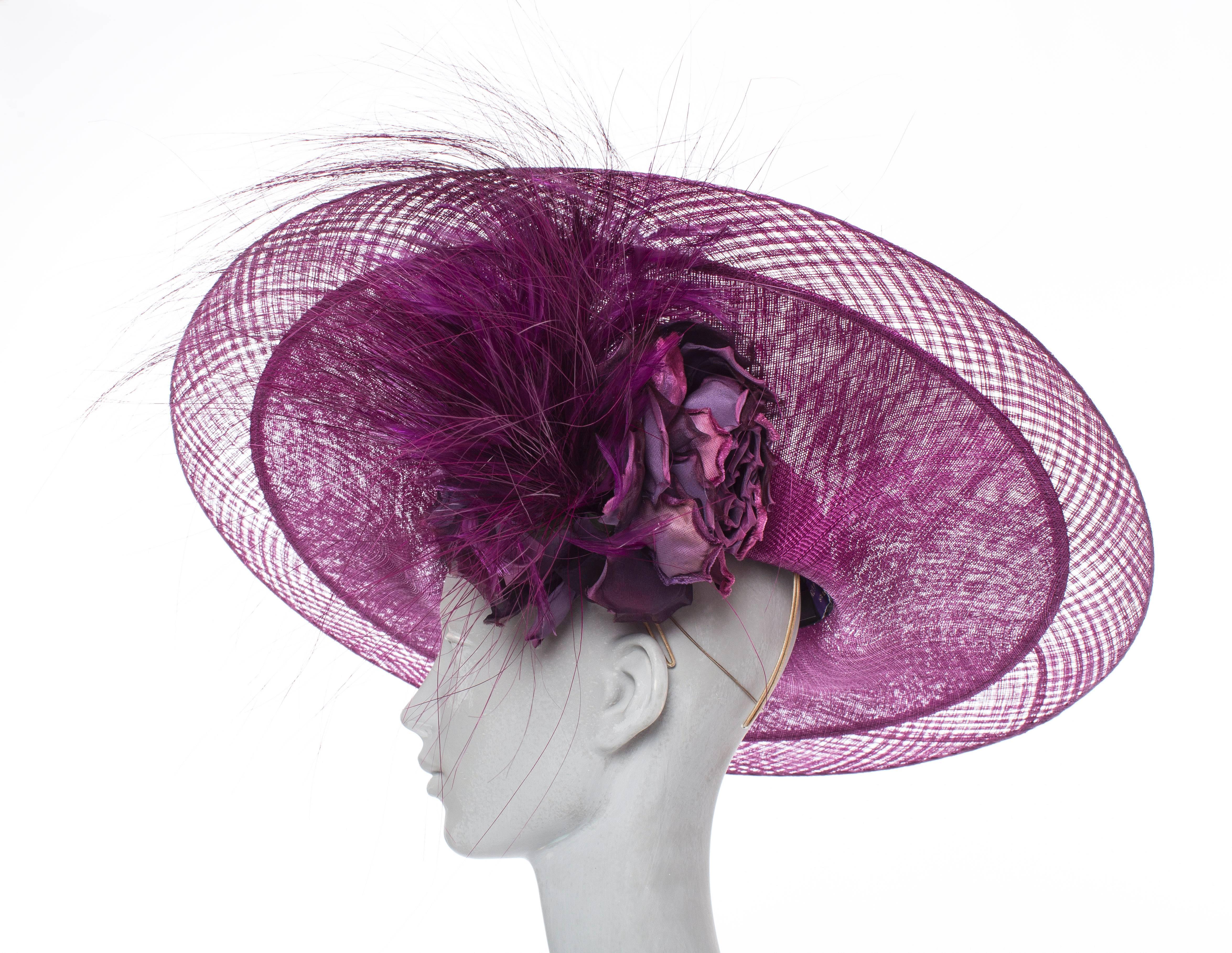 Philip Treacy sinamay side slice hat with feather and floral adornment at side and Includes box.

Circumference 20”, Brim 6.5”