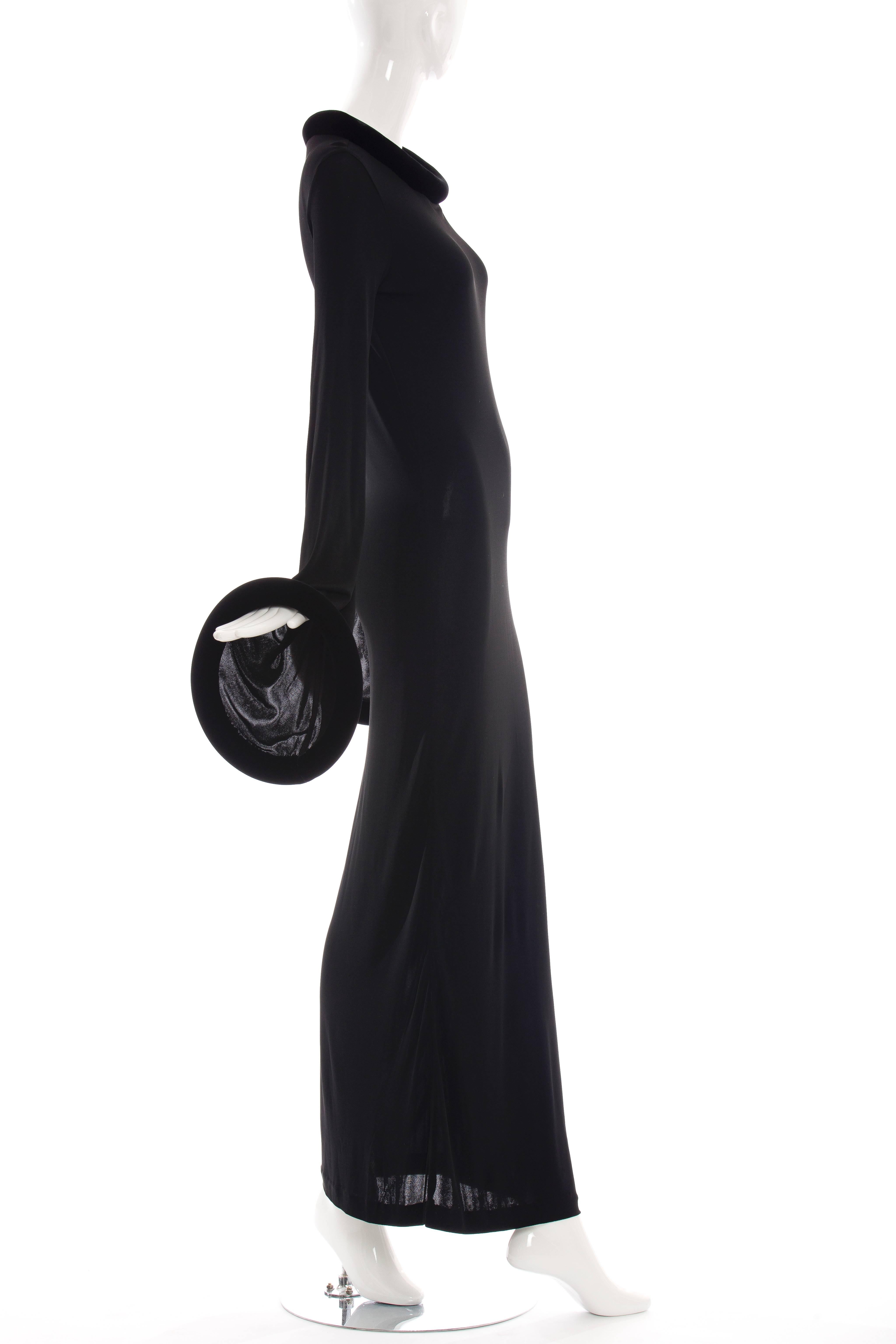 Jean Paul Gaultier, circa 1995, black long evening dress with velvet bateau neckline and velvet angel sleeves.

Bust 36