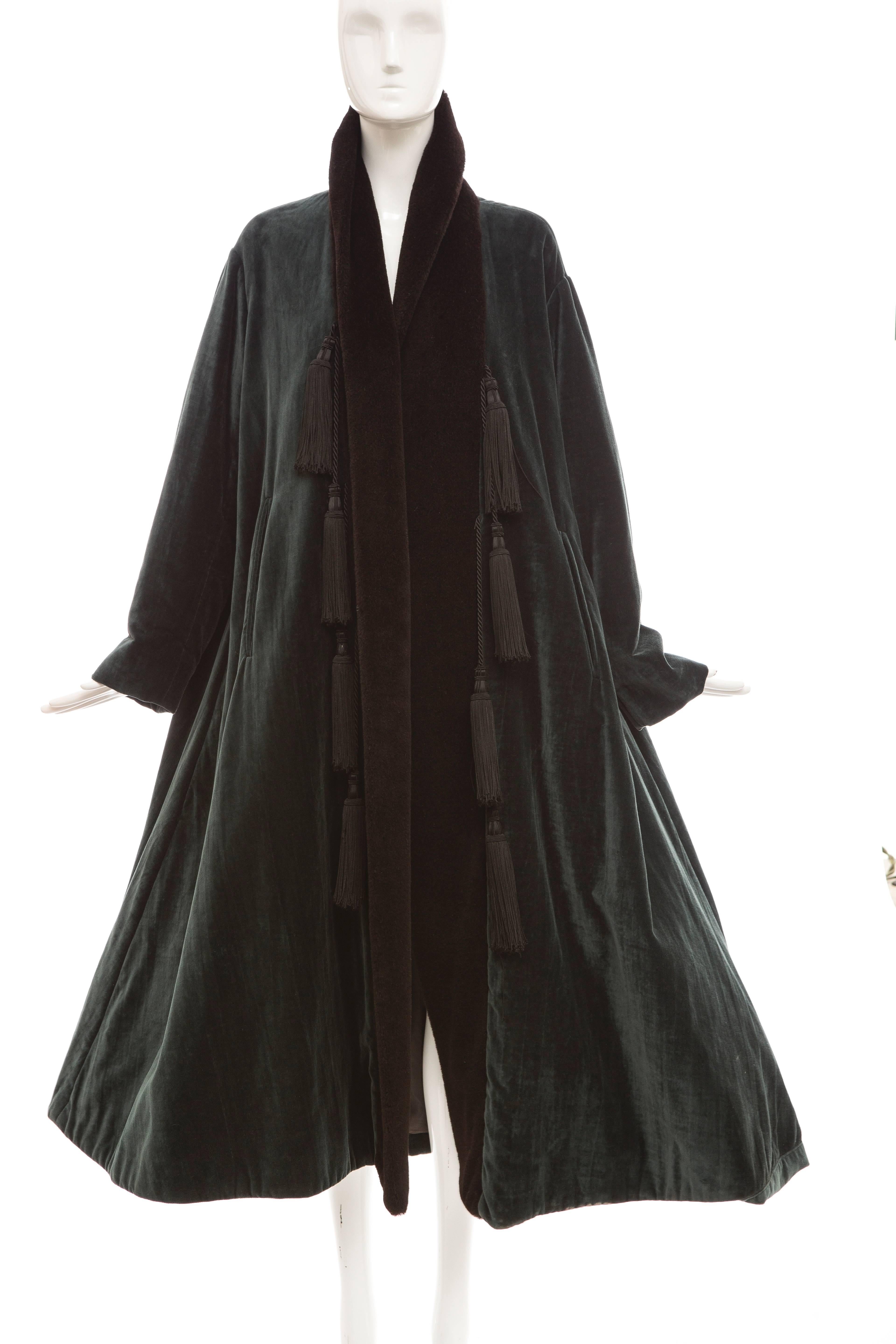 Romeo Gigli, Fall 1994, cotton velvet swing coat with poly fleece lapel, embellished tassels, two front pockets and fully lined in silk.

US. 6 - 8