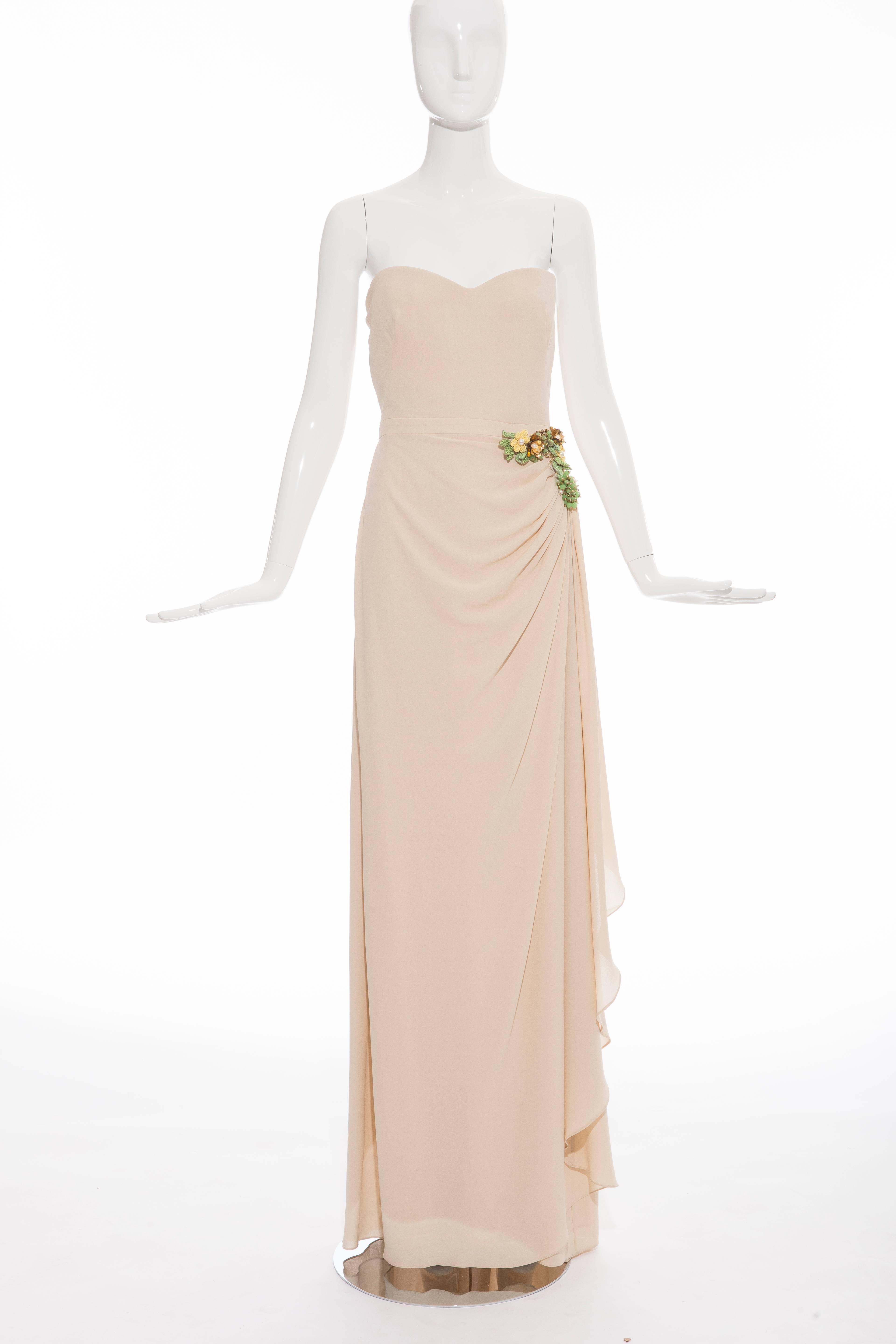 Gucci, Spring-Summer 2012, nude silk strapless sweetheart neck evening dress with draping at side, yellow, green and gold embellishments featuring pearls forming floral arrangement, concealed back zip closure and built in brassiere.

IT. 42
US.