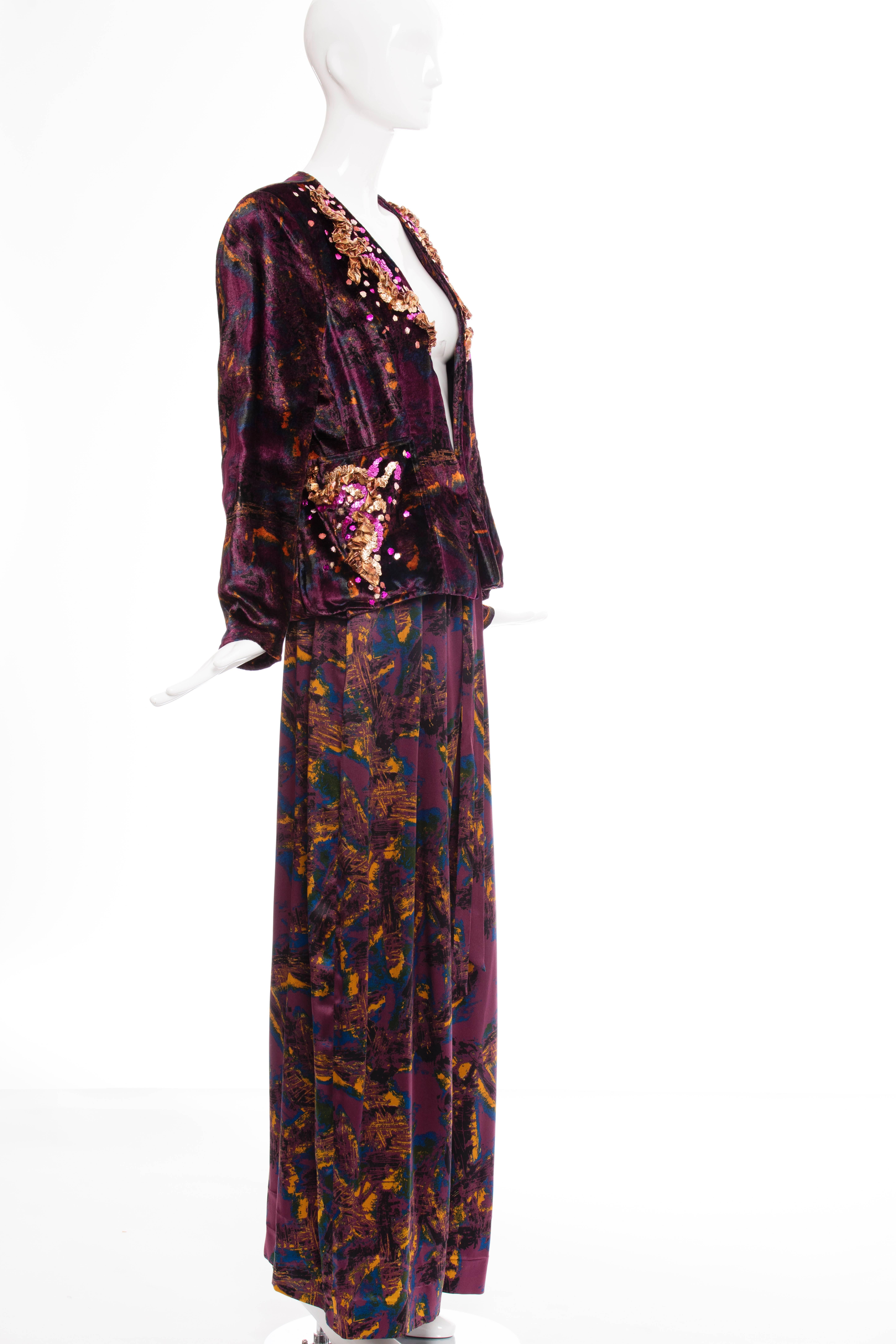 Christian Lacroix, circa 1980's, palazzo pant suit. The printed velvet jacket has two front pockets, embellished with sequins and fully lined. The printed silk charmeuse palazzo pants has two front pockets, tie front and hook and eye closure.

FR.