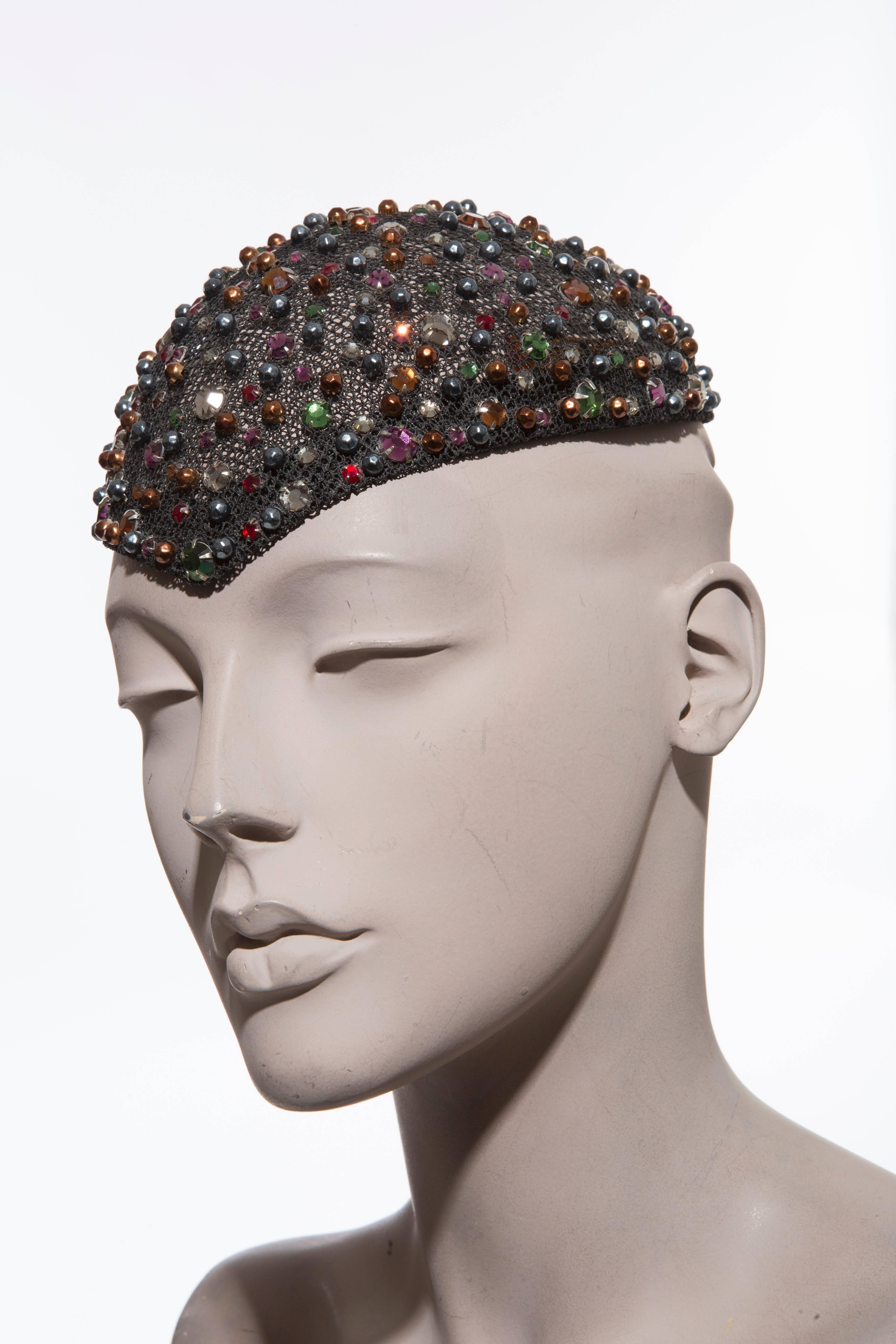 Frank Olive, circa 1950's prong set swarovski crystal, mesh skull cap with crystal veil.