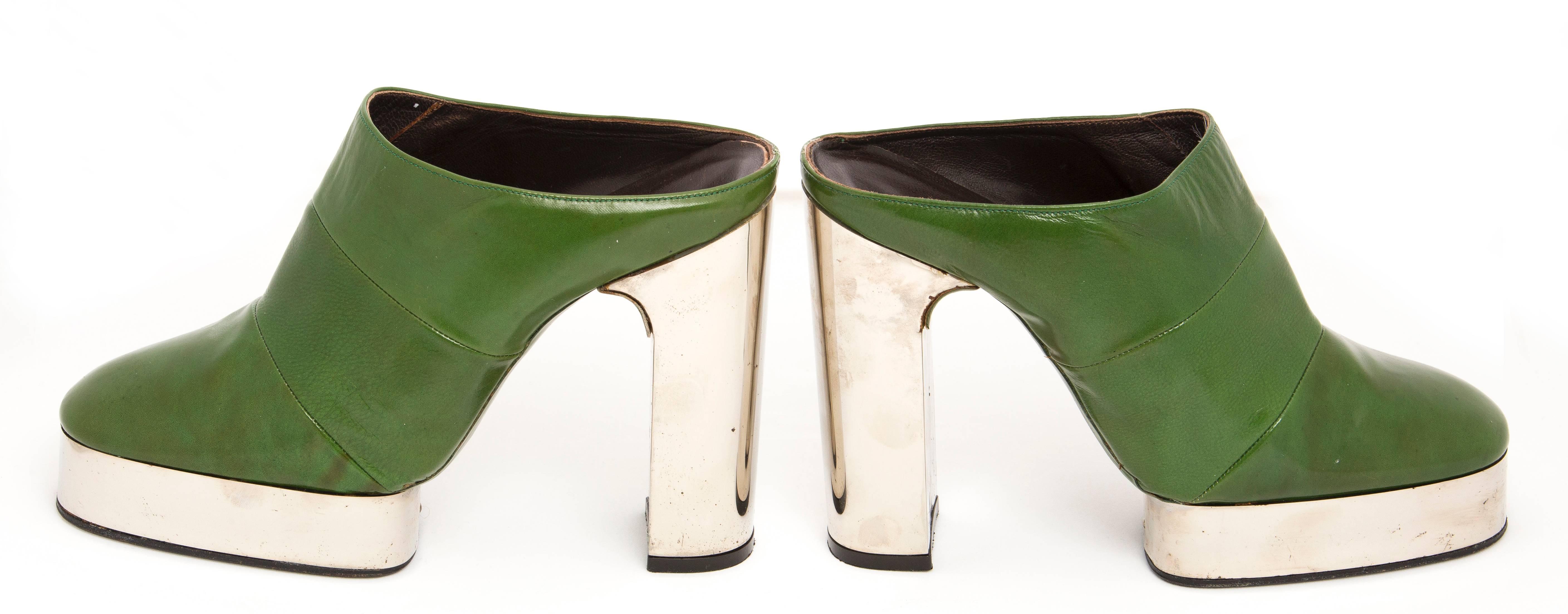 Bally by Pancaldi, circa 1970's apple green leather platform shoes.

Size: 7 1/2 US
Heel Height: 5 inches
Platform Height: 1 inches
Length: 9 1/2 inches
Width: 3 inches
