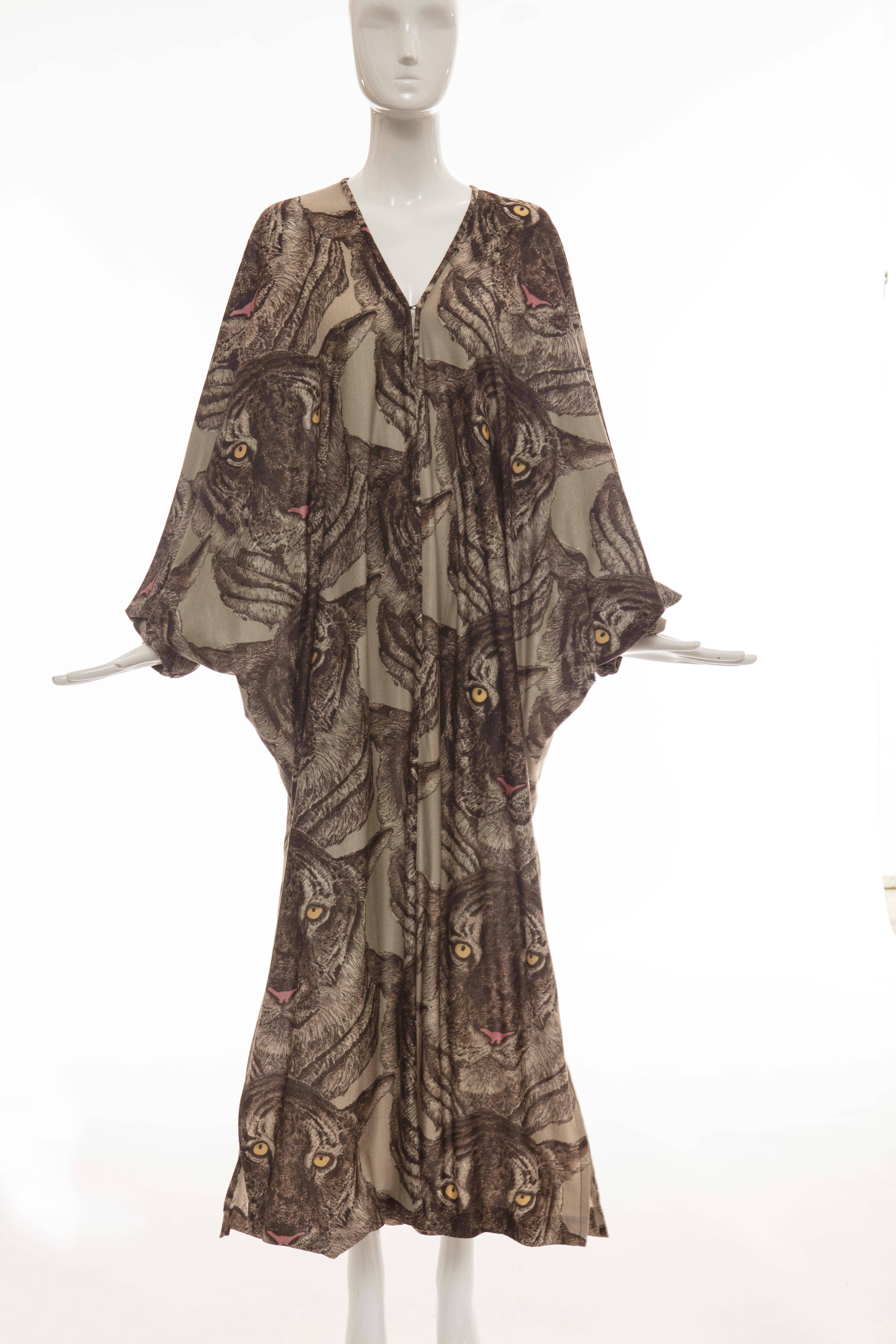 Mr. Blackwell, circa 1980's, tiger-printed kaftan with deep-V front with hook and eye,  and two front side slits.

Length: 55.5