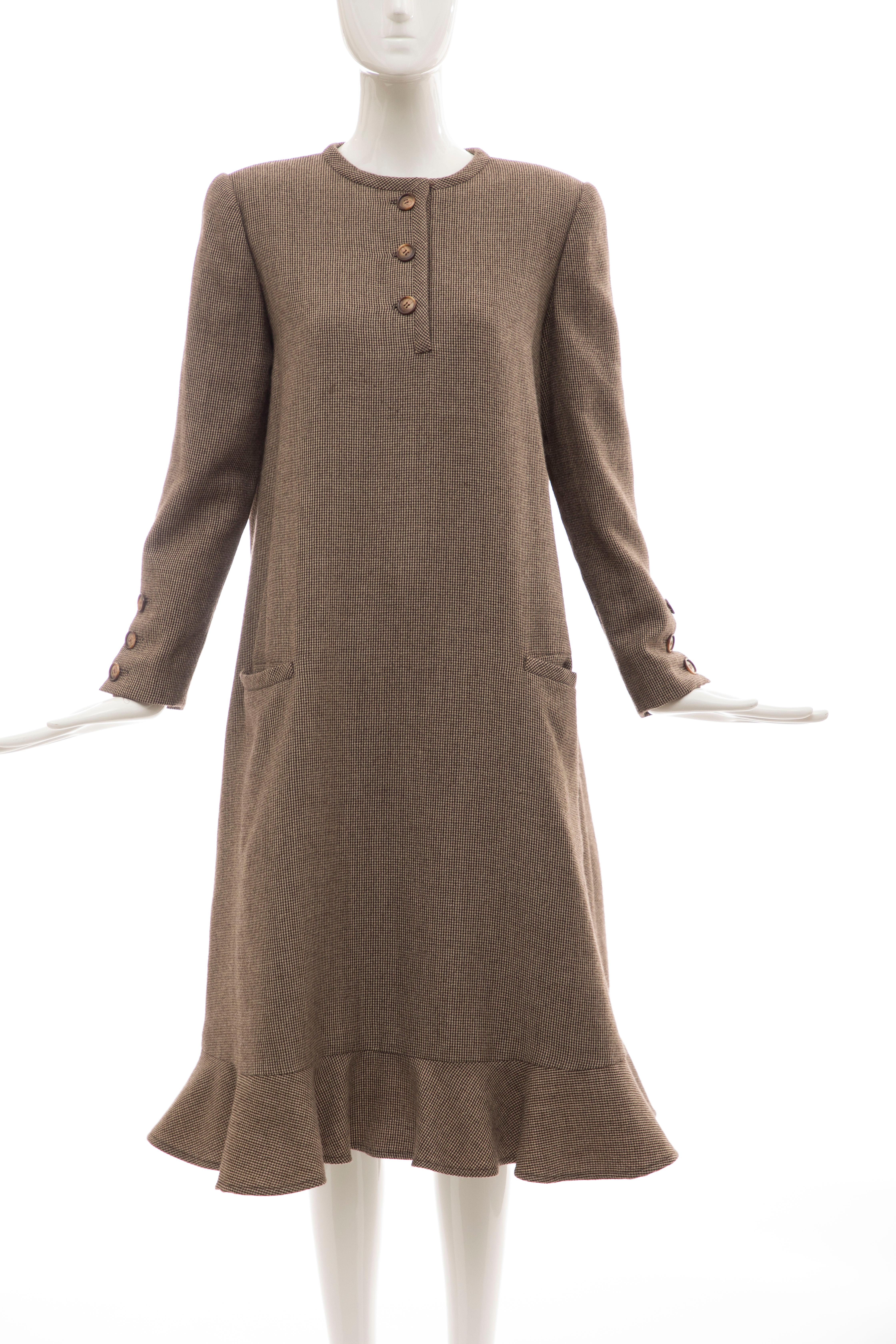 Bill Blass, Circa: 1970's long-sleeve A-line wool brown tweed button front dress, back zip with two front slit pockets and fully lined in silk.

US. 8

Bust: 40, Waist: 46, Hip: 56, Sleeve: 23, Shoulder: 16, Length: 45
