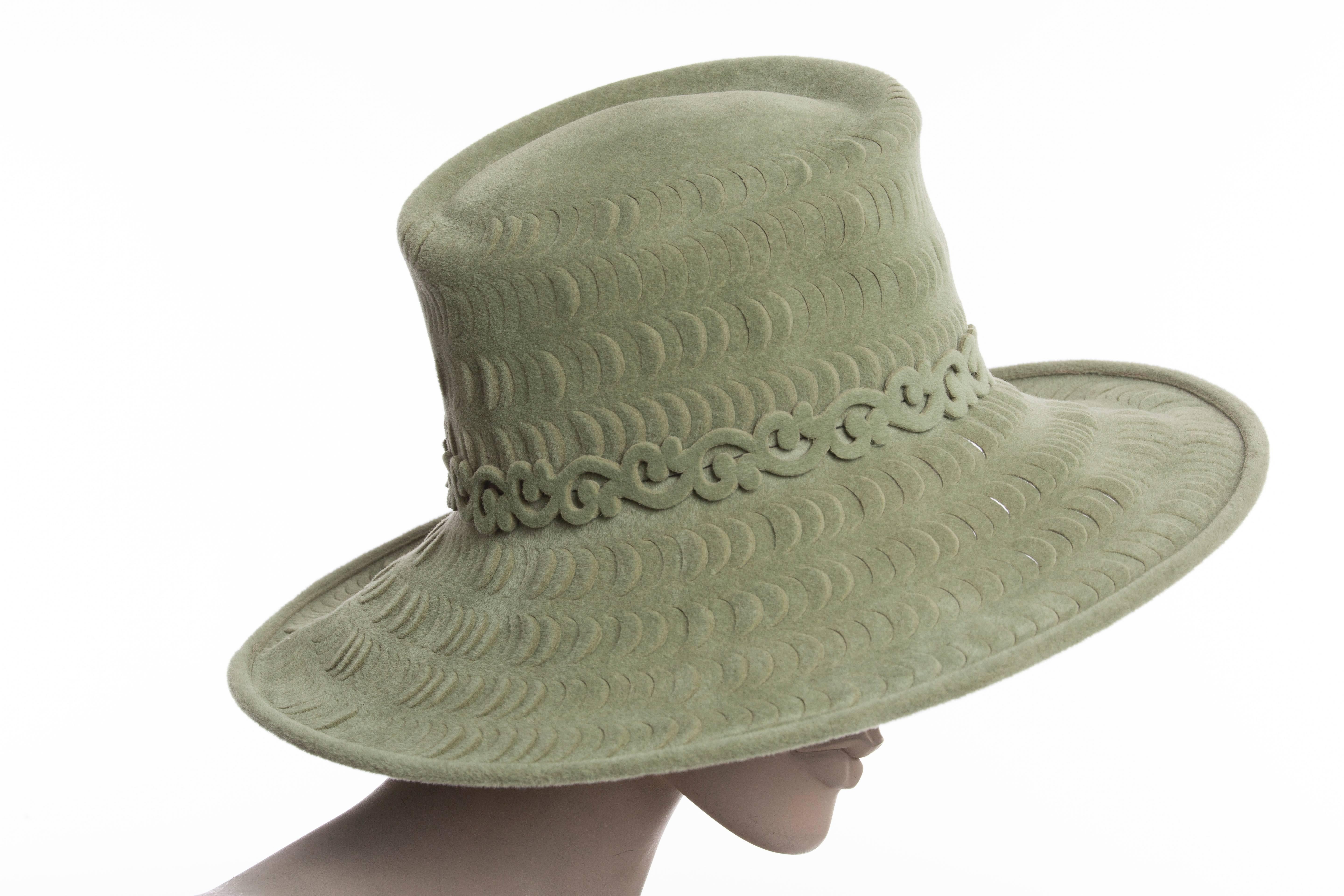  Philip Treacy sage green wool felt side-swept hat with scalloped details throughout and lasercut paisley trim. Includes hat box.

Circumference 25”, Brim 4.5”