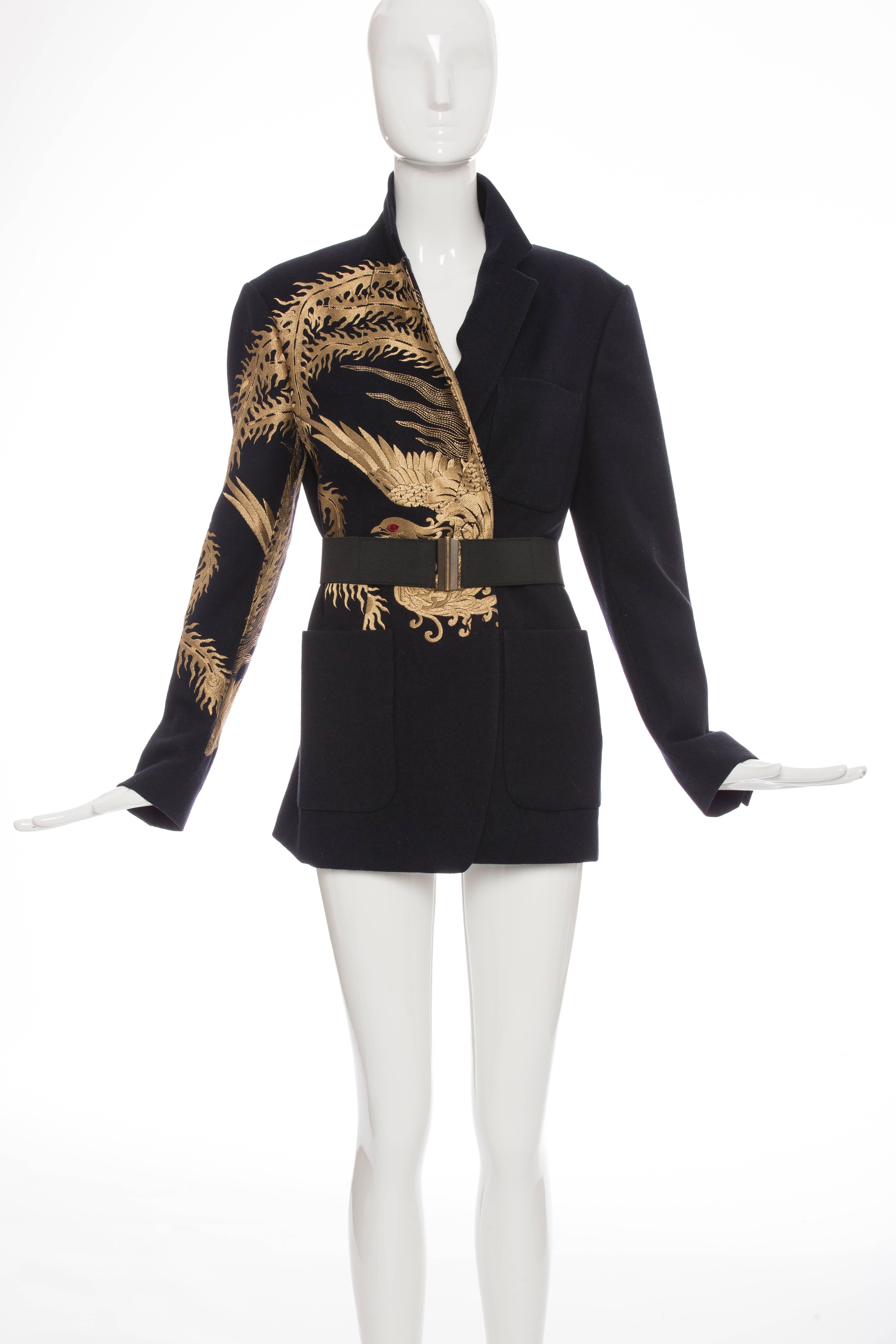 Dries Van Noten, Autumn-Winter 2012, navy blue, wool jacket with gold-tone embroidery, three pockets, hidden dual snap closures at front and belt.

FR. 38
US. 6

Bust 32”, Waist 32”, Shoulder 18”, Length 28”, Sleeve 25”

Fabric Content: 82%