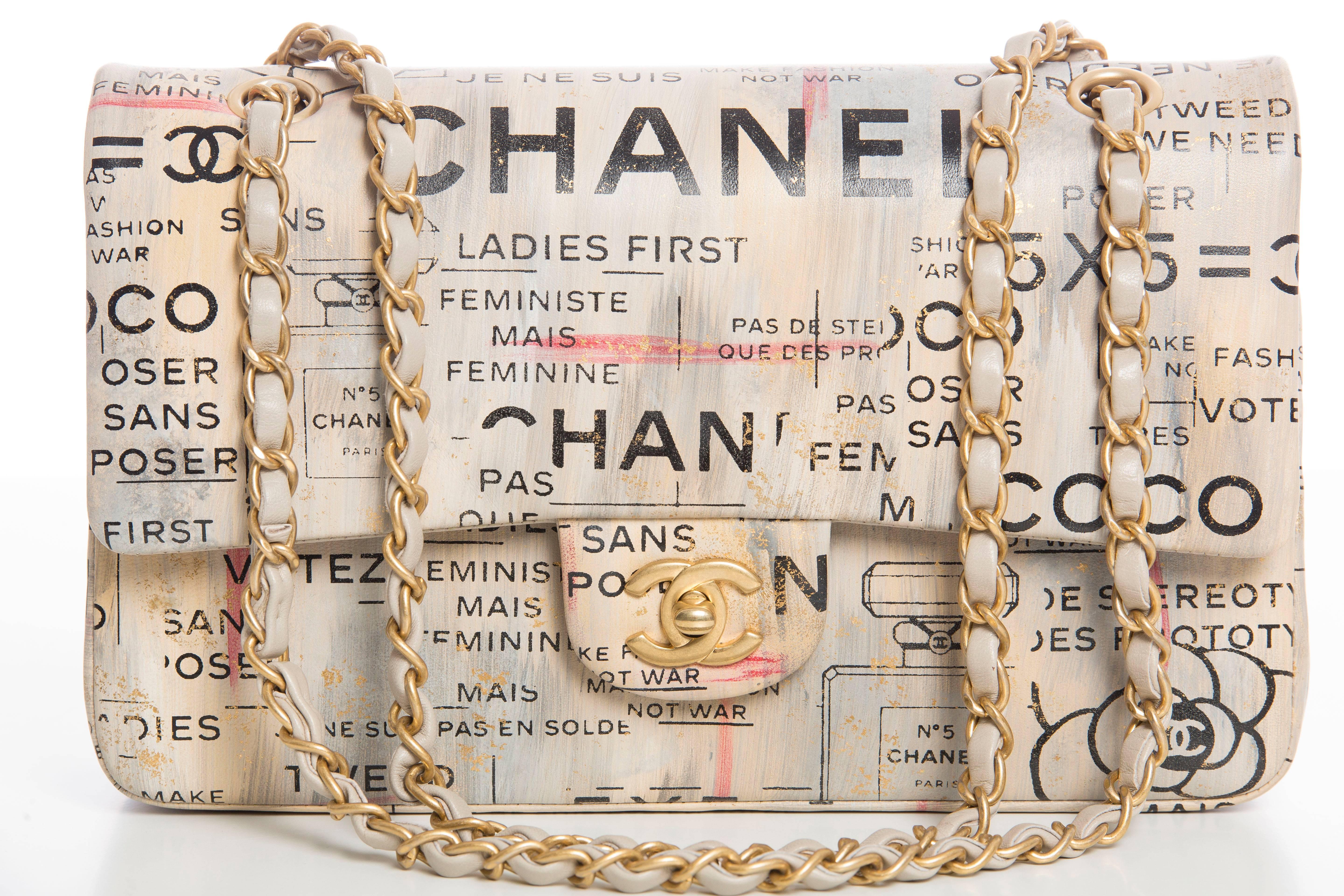Chanel, Spring-Summer 2015, limited edition, newspaper print, lambskin, medium, graffiti logo, double flap bag with box, dustbag, care booklet, cleaning cloth.

Serial Number: 21045369

6.3’ x 10’x 3’ inches