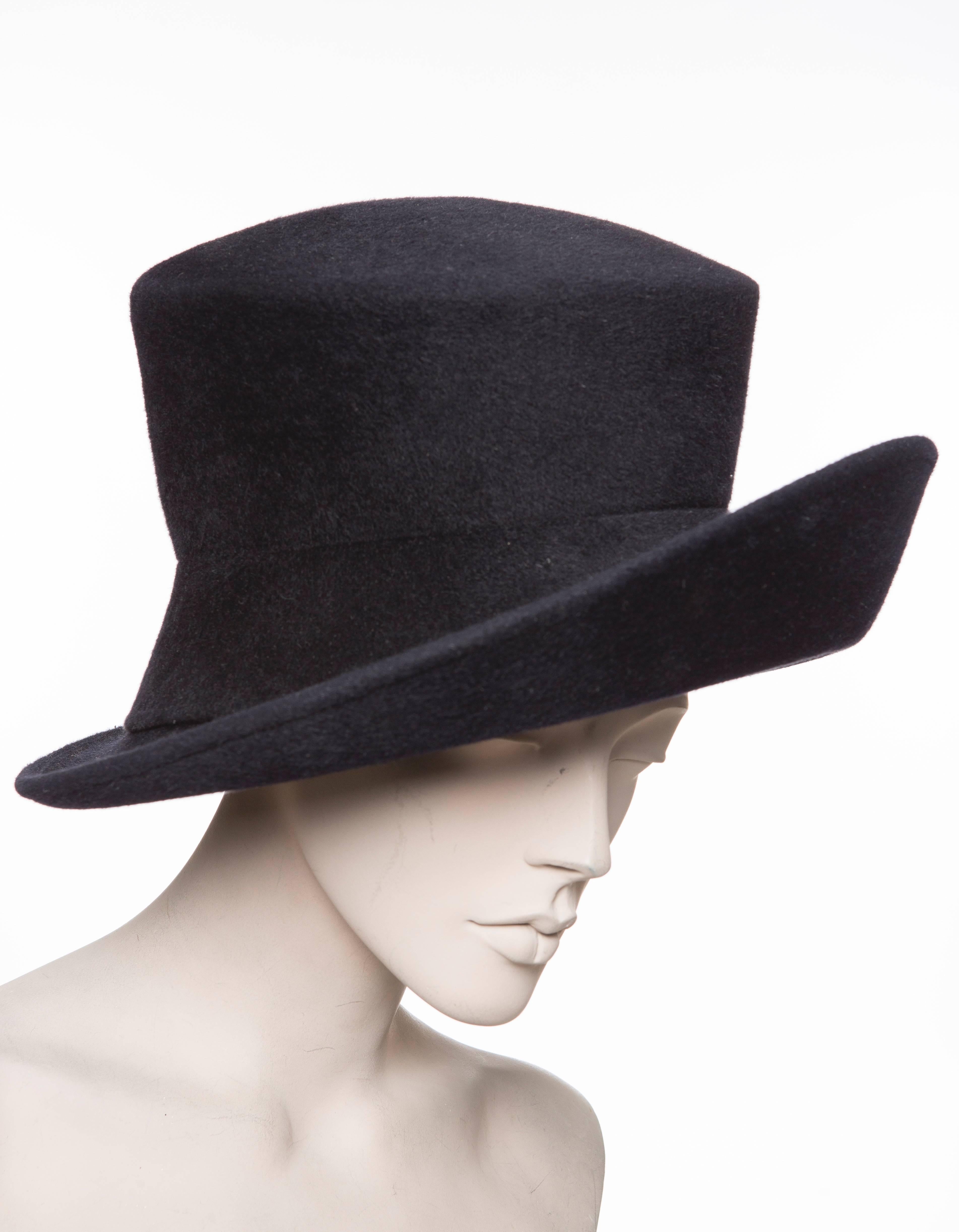 Philip Treacy navy blue wool felt hat.

 Circumference 20