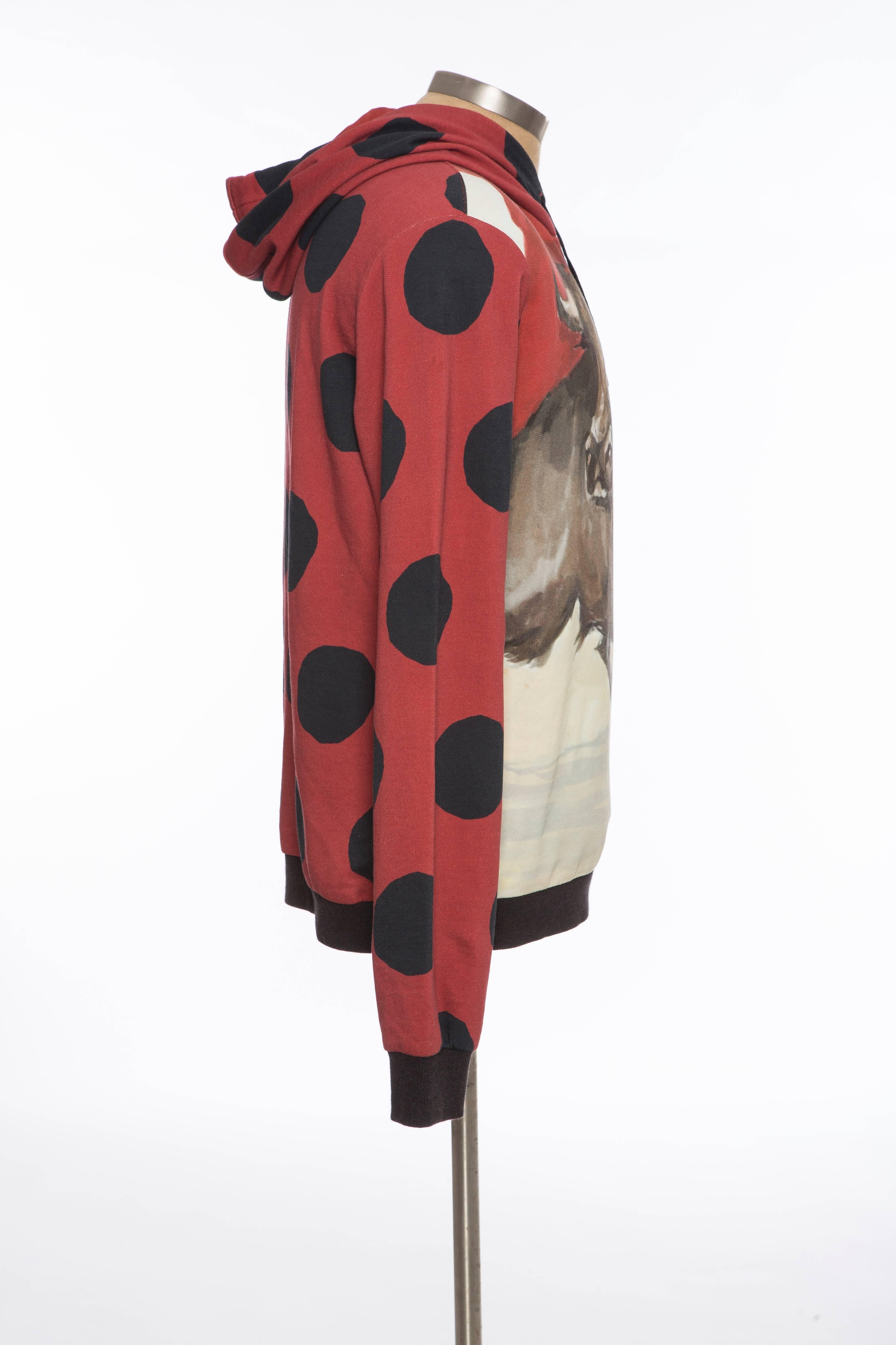 Dolce & Gabbana, Spring/Summer 2015, men's cotton pullover sweatshirt with bull print throughout and rib knit trim.

IT. 52
US. 42

Chest 44”, Length 26