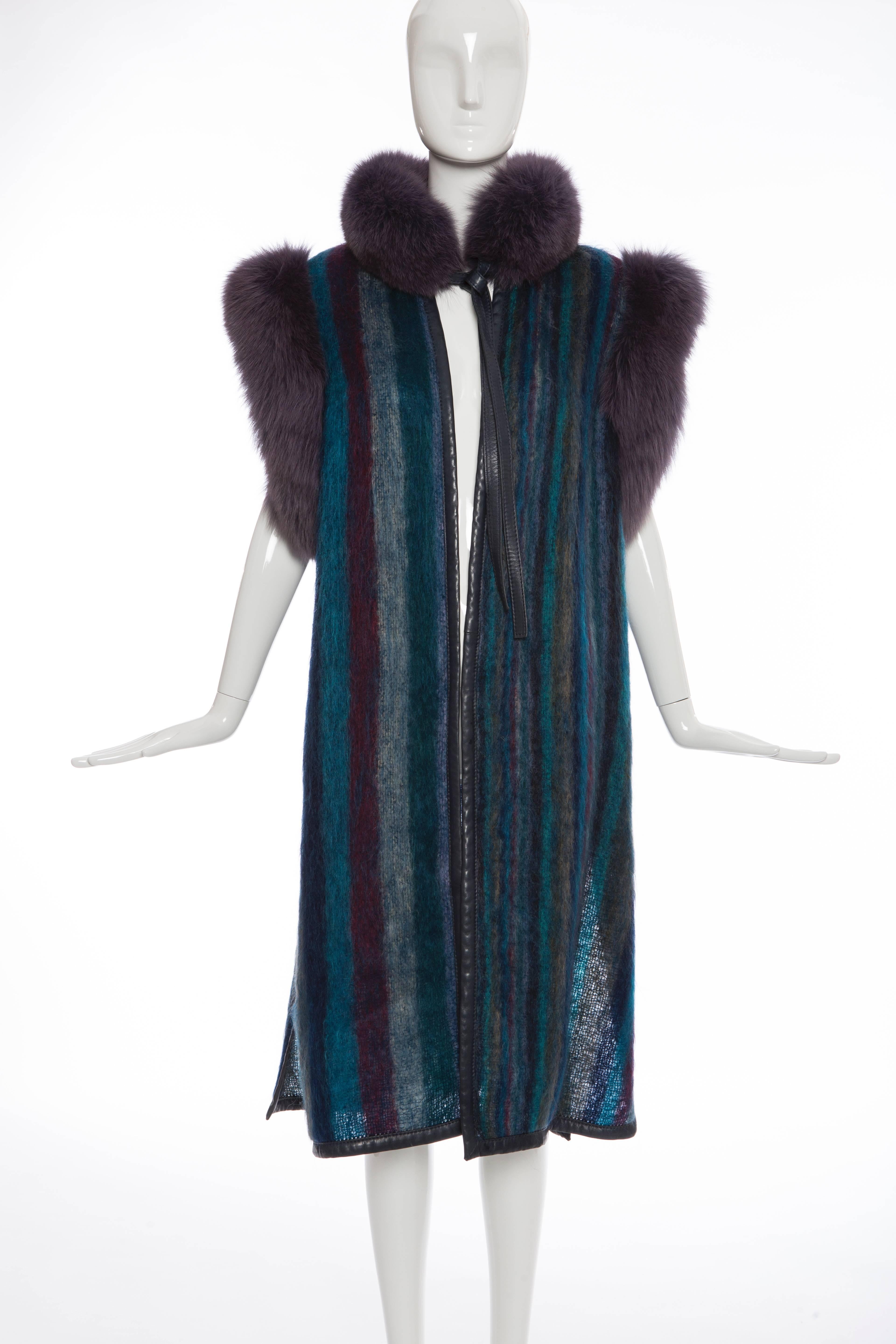 Christian Dior Boutique Fourrure by Frédéric CASTET, circa 1980's, striped mohair vest with leather trim, fox fur collar and trim at underarms, slit at sides, button closure at sides and  leather self tie closure at neck.

 Bust 44”, Waist 44”,
