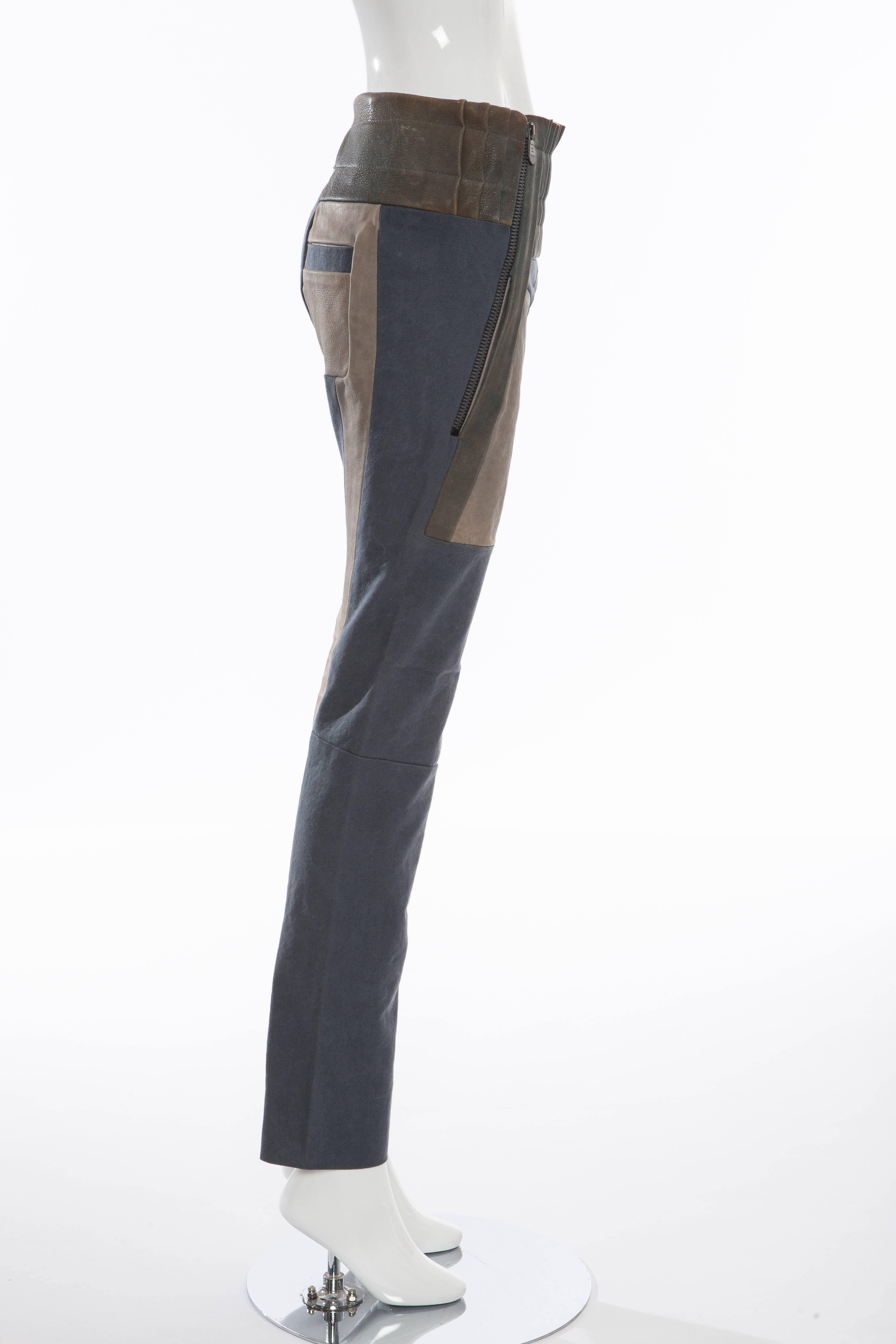 Balenciaga by Nicolas Ghesquière, Spring-Summer 2010, leather moto paneled pants with tonal stitching, elasticized waist, slit pockets at sides and dual exposed zip closure at front. 

Size not listed, estimated from measurements.

Small
Waist