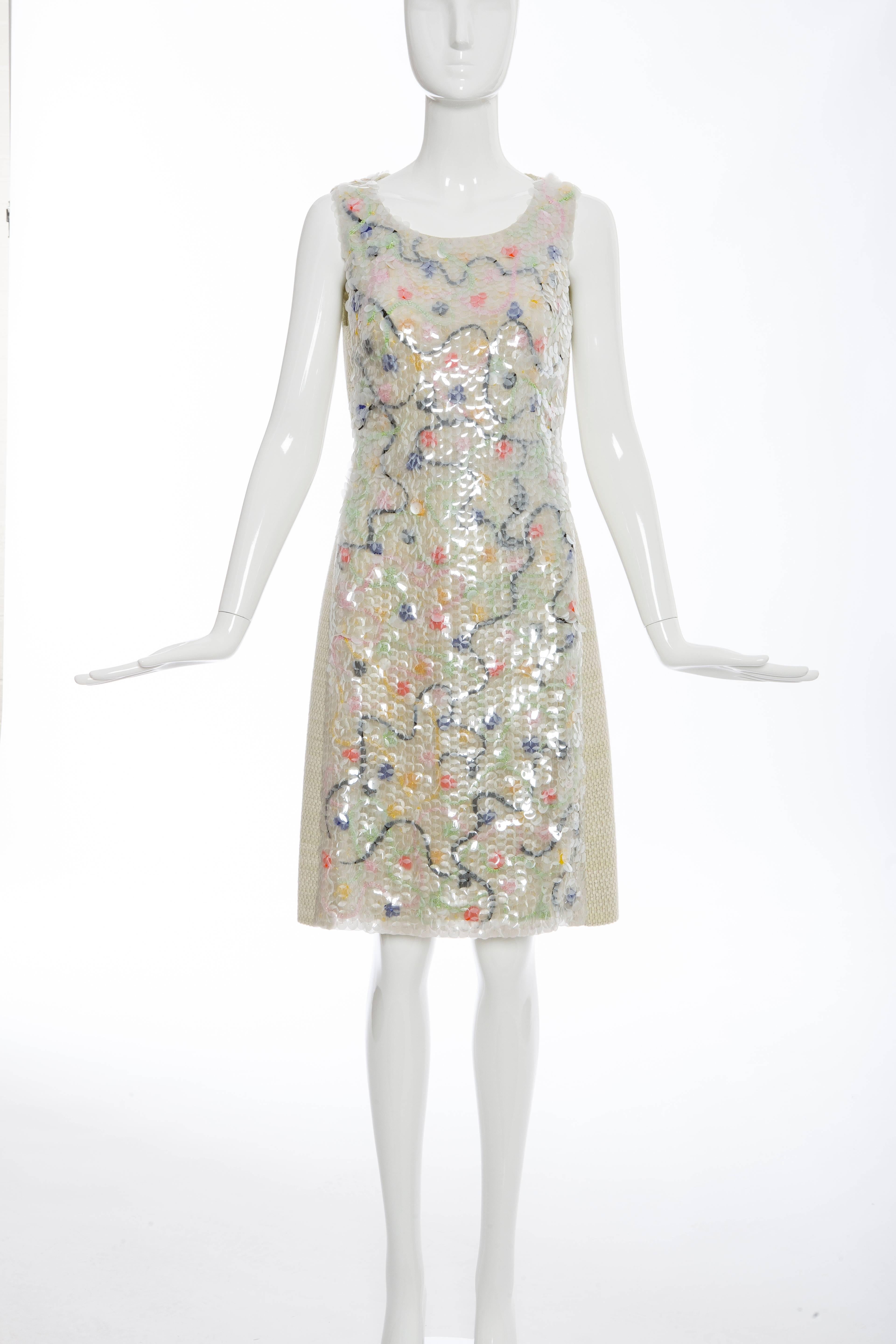  Chanel, Fall 2001, wool sleeveless tweed dress featuring front clear paillettes and polychrome bead accents, back pleats, sash tie at back waist, concealed back zip closure and fully lined in silk.

FR.38
US. 6

 Bust 32