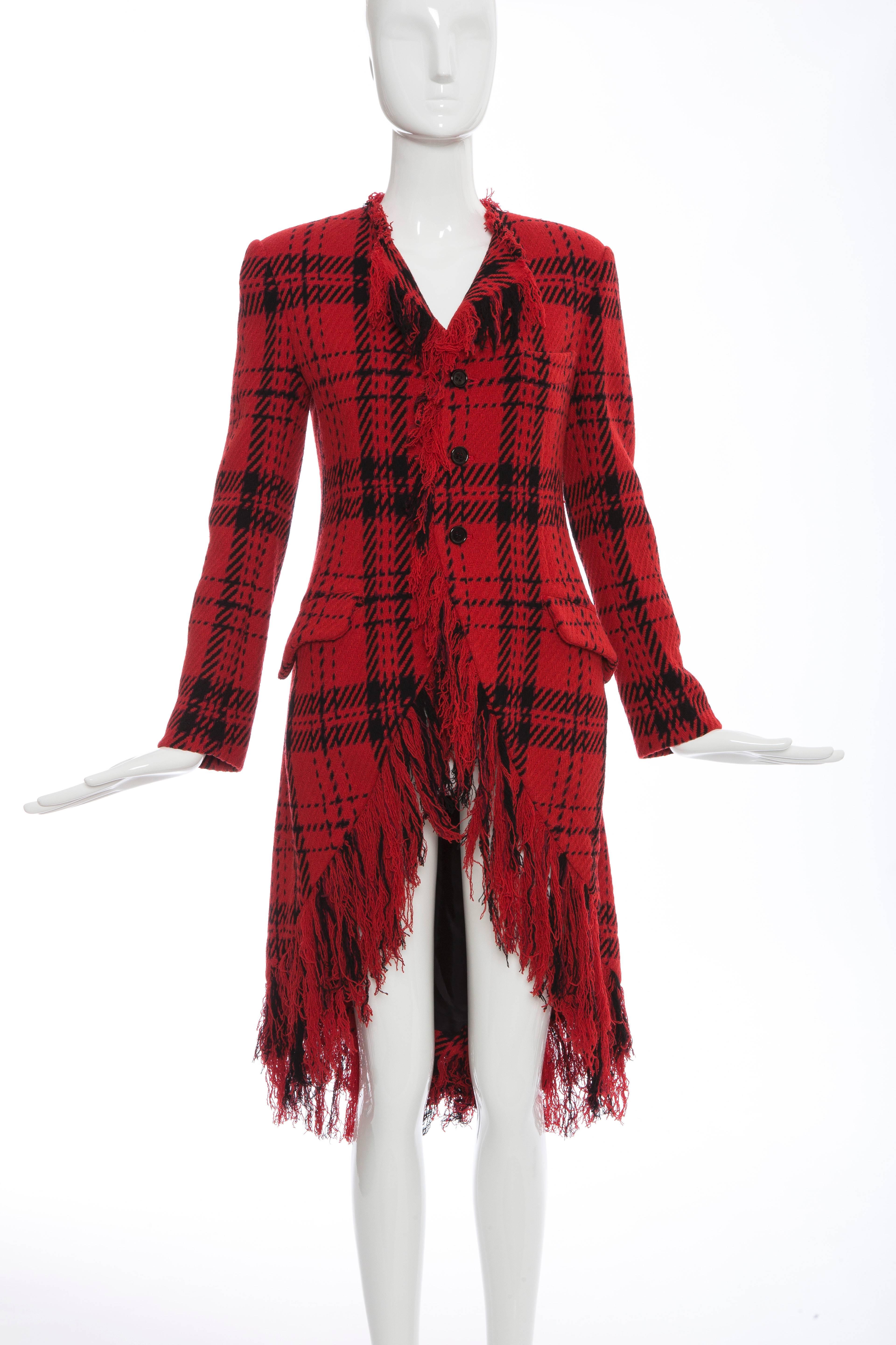 Yohji Yamamoto, Autumn/Winter 2003, red and black wool tartan fringed jacket with dual front flap pockets, front welt pocket, front button closures and fully lined.

The jacket was exhibited at the V&A "Yohji Yamamoto" exhibition