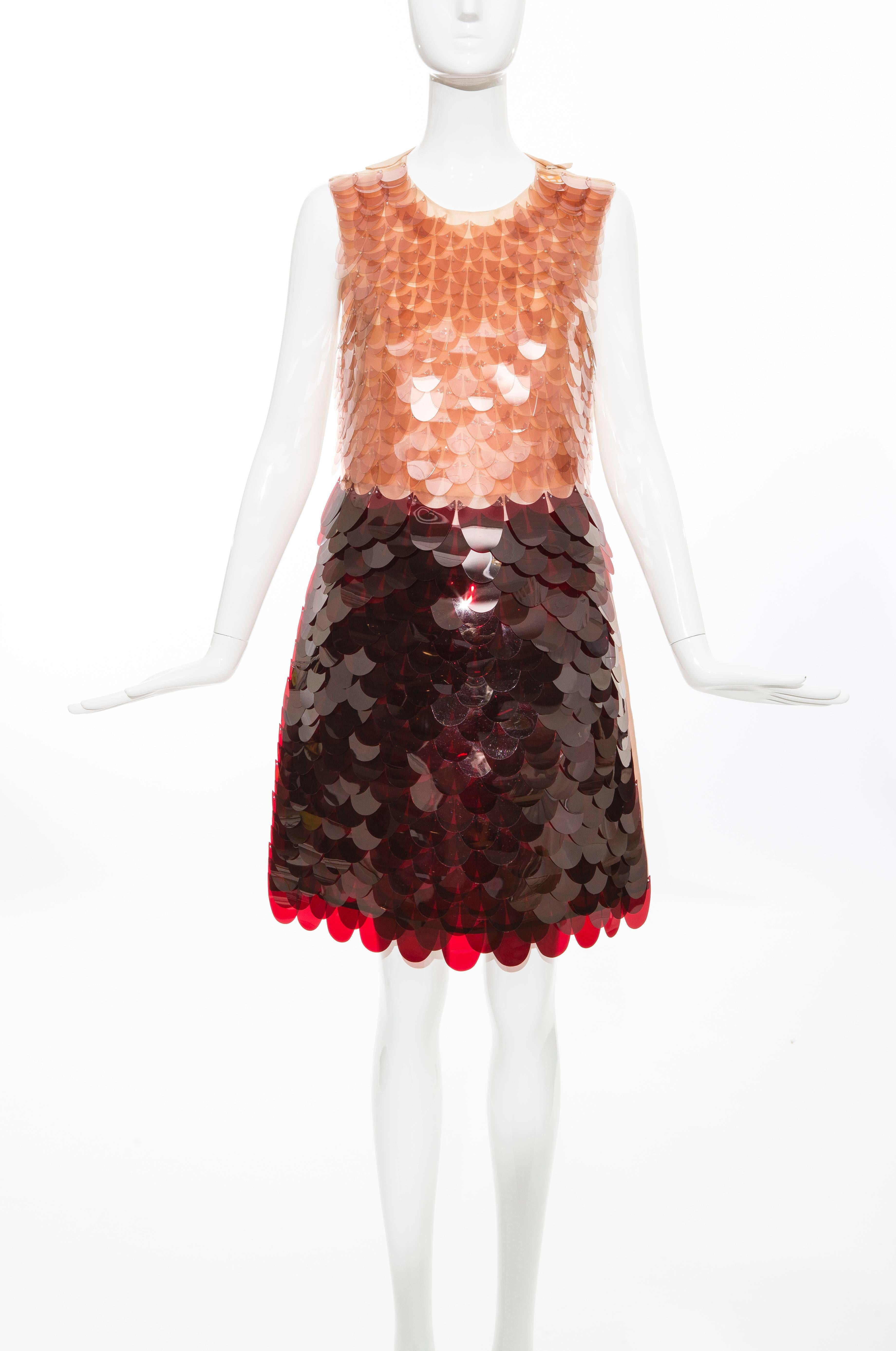 Prada, Autumn-Winter 2011, sleeveless dress with paillettes, side zip, scoop back and fully lined. 

The dress was on the cover of Vogue magazine with Emma Watson, July 2011 and exhibited at the Met's Spring 2012 Costume Institute exhibition,