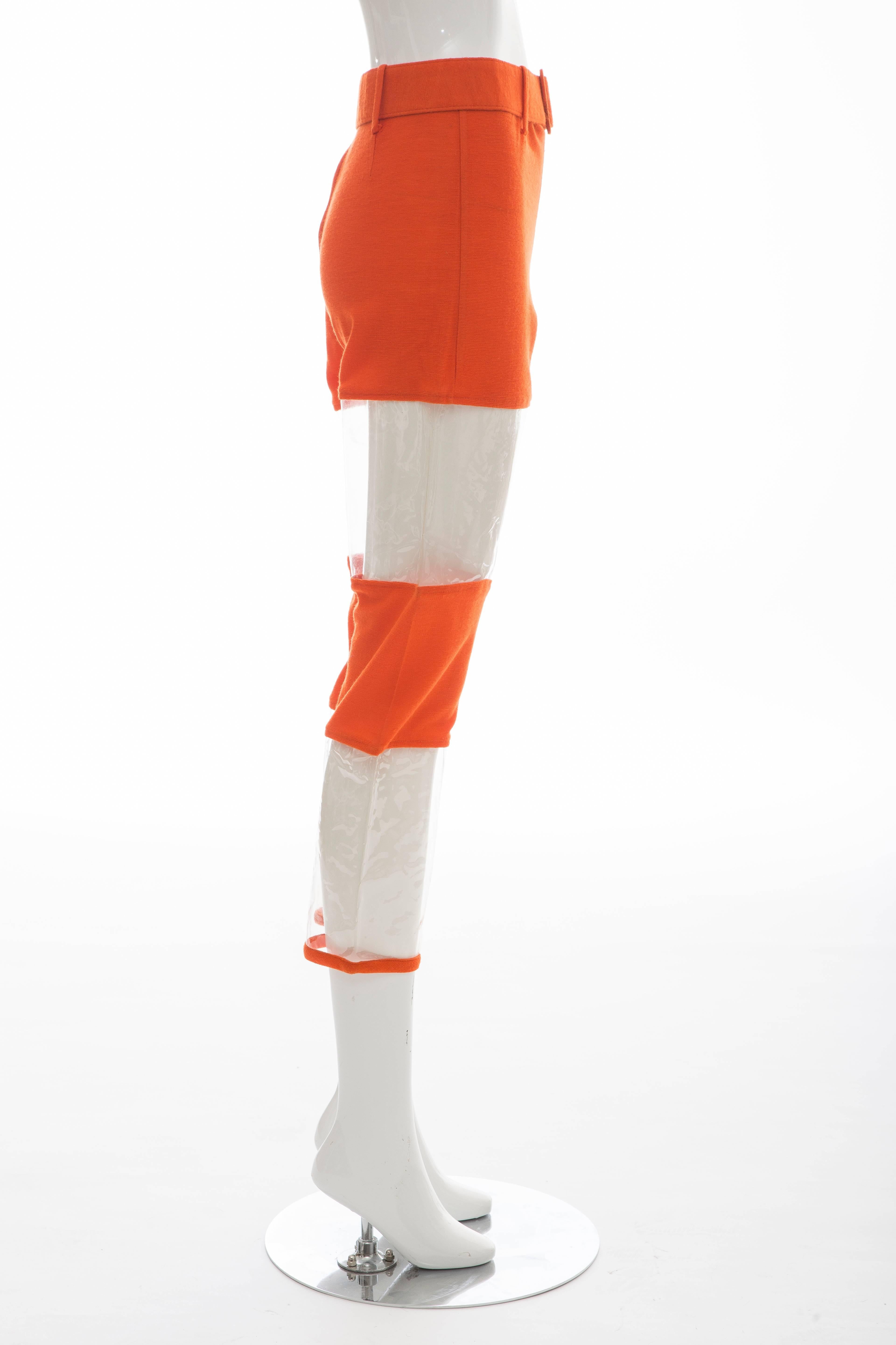 Rudi Gernreich, circa 1960's, orange wool high waisted trousers with plastic panels, back zip and self belt,