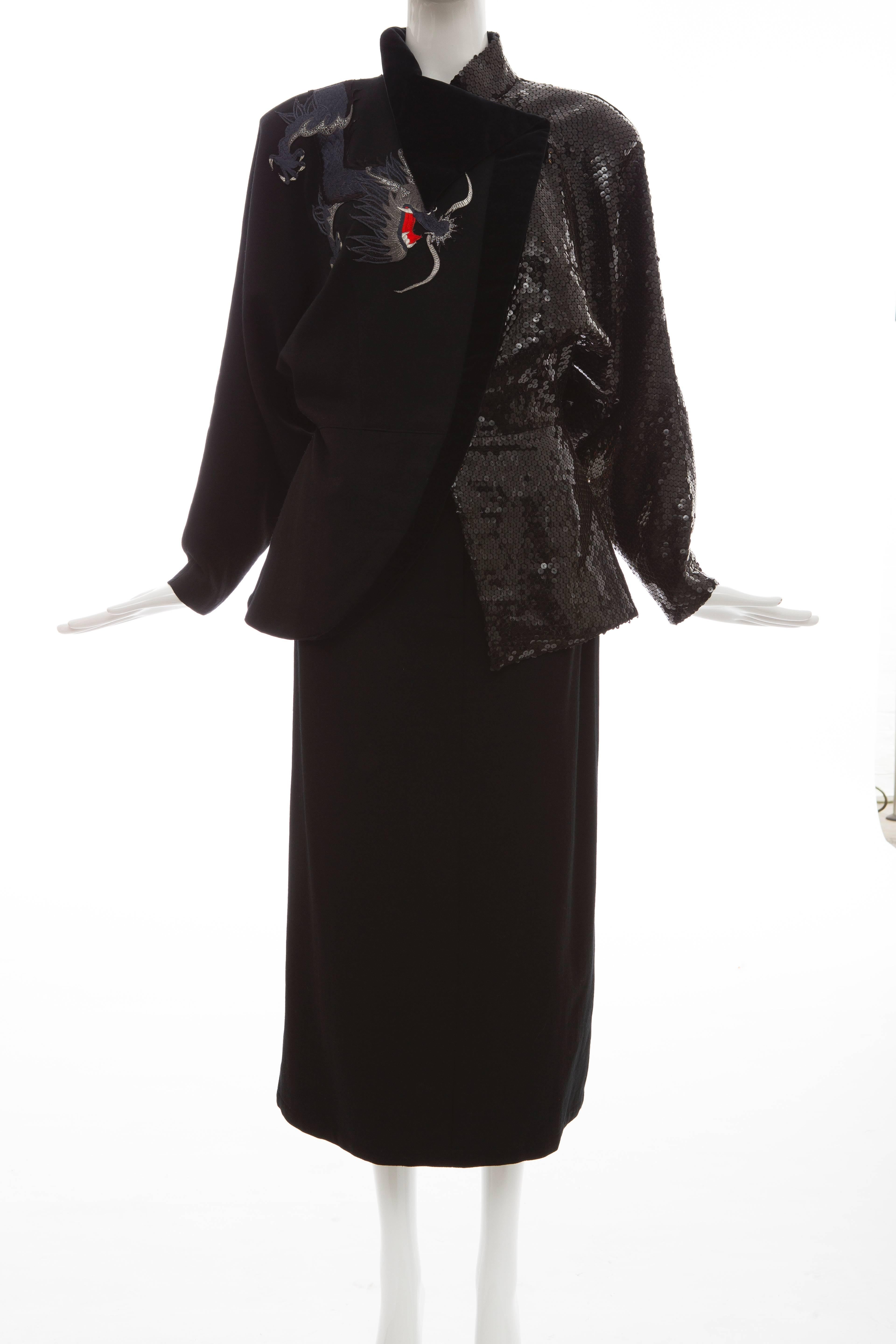 Kansai Yamamoto, circa 1980's, black wool skirt suit, snap-front jacket has embroidered dragon, mandarin collar, velvet trim, half wool and sequins and fully lined with zip and button front skirt.

Jacket: Japan, Medium
Skirt: Japan,