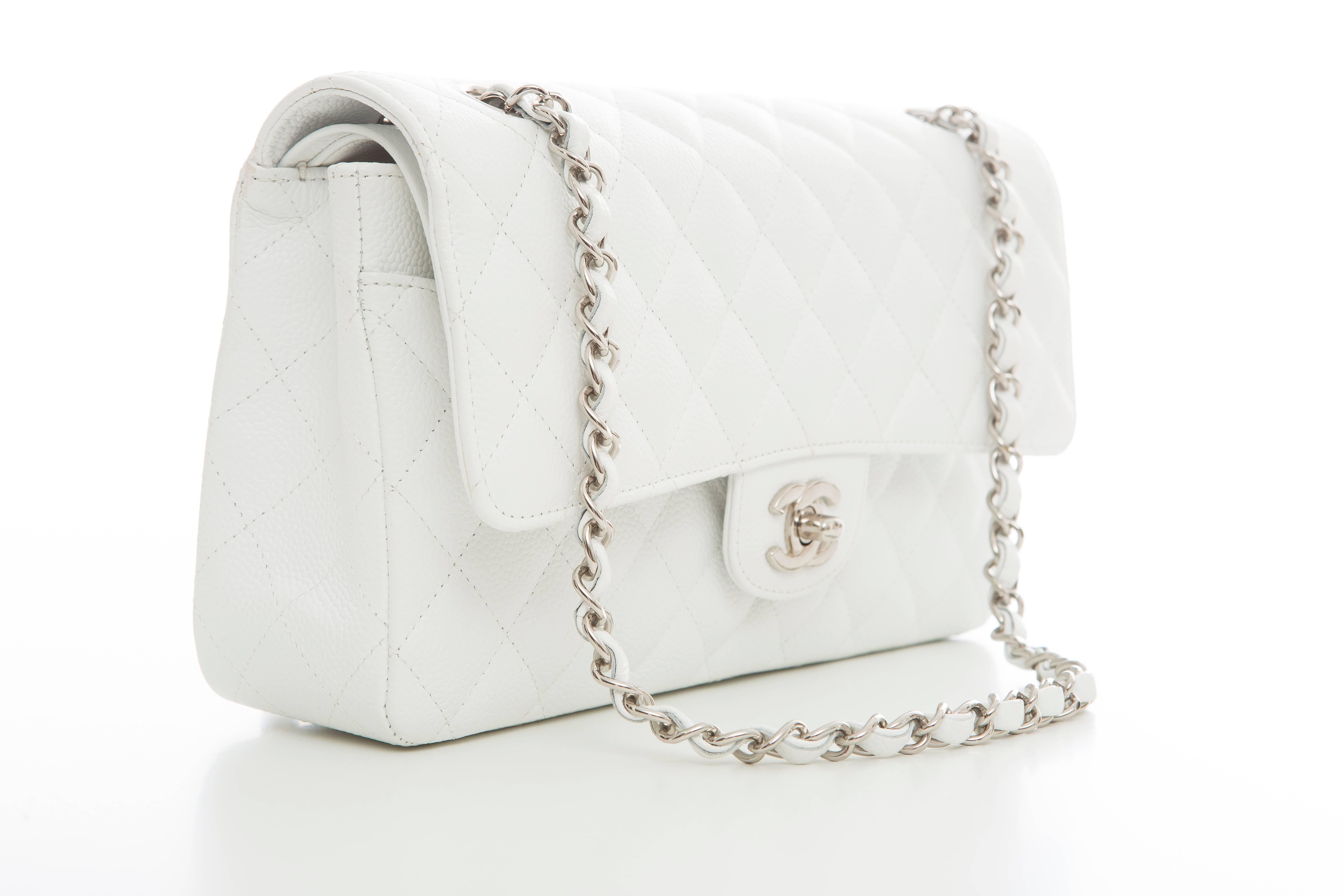 Chanel, Spring-Summer 2006, white quilted caviar medium leather classic double flap bag with silver-tone hardware, dual chain-link and leather shoulder straps, single exterior pocket, white leather lining, dual interior compartments and signature