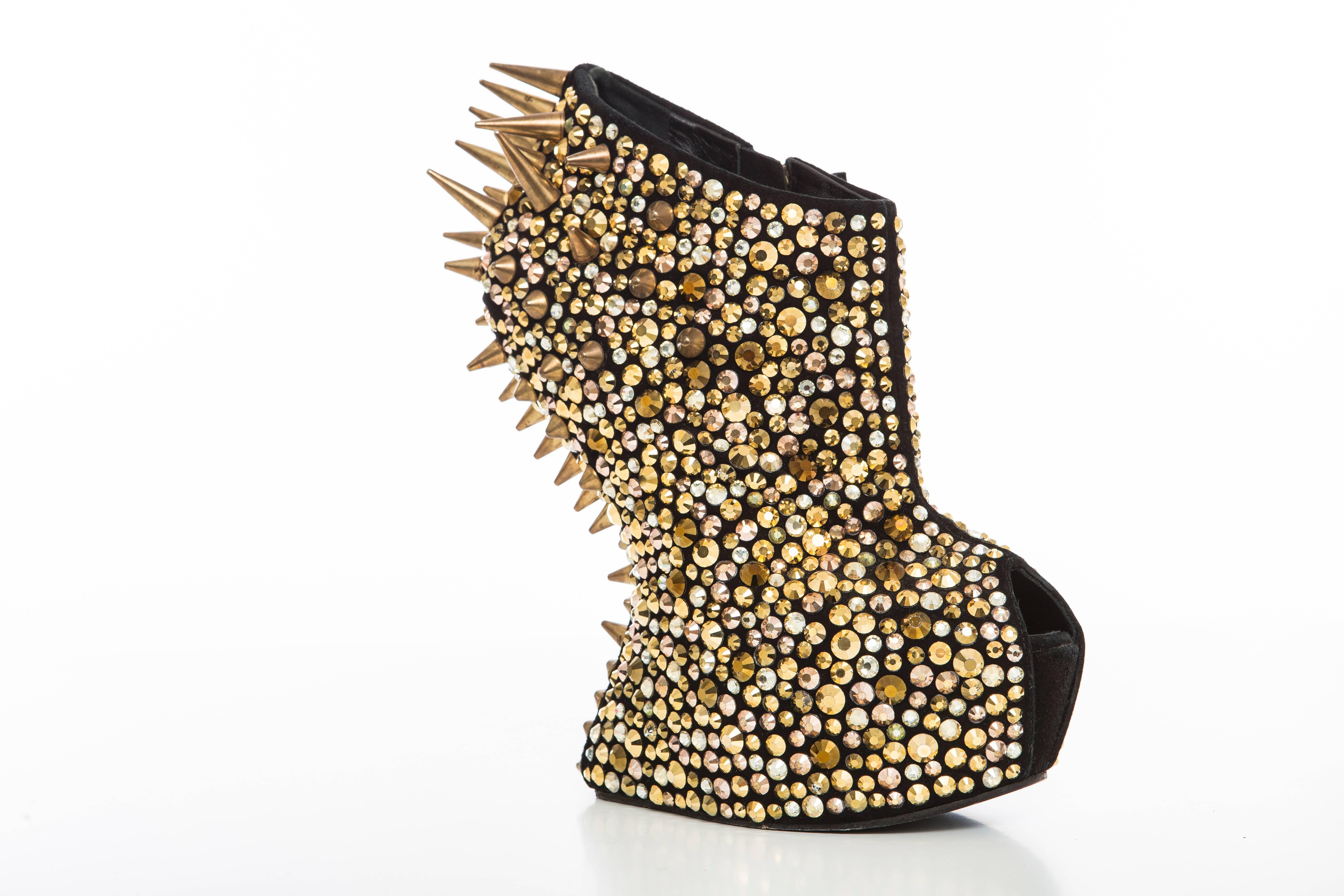  Giuseppe Zanotti, Autumn-Winter 2012, black suede platform booties with gold-tone hardware, stud embellishments throughout featuring spike embellishments at counters, concealed platforms and sculpted heels and zip closures at inner