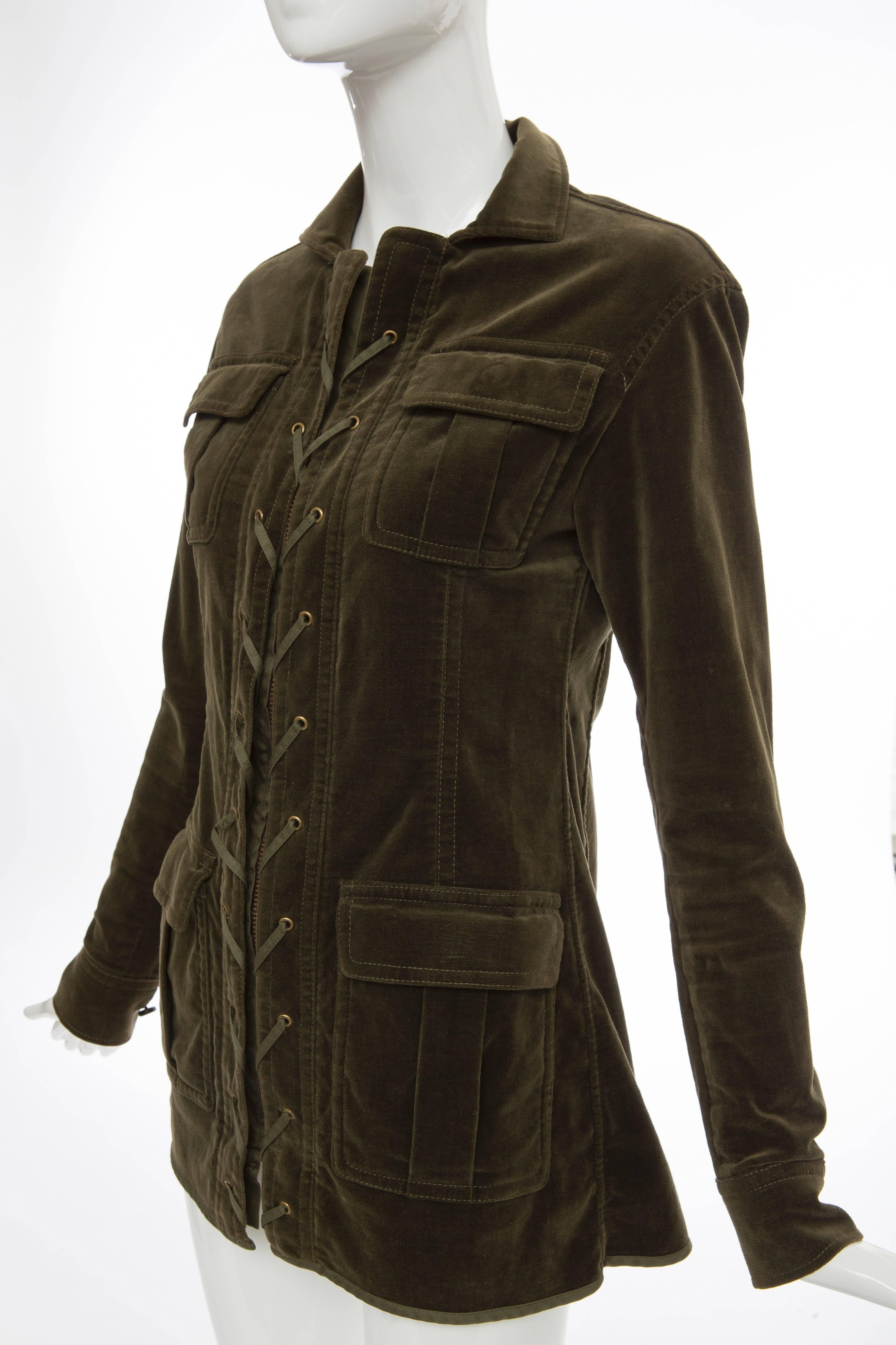 Tom Ford for Yves Saint Laurent, Autumn-Winter 2004, olive green velvet safari jacket with four patch pockets at front, lace up detailing at placket and concealed zip closure at front.

FR. 34
US. 2

Bust 33”, Waist 33”, Shoulder 16”, Length