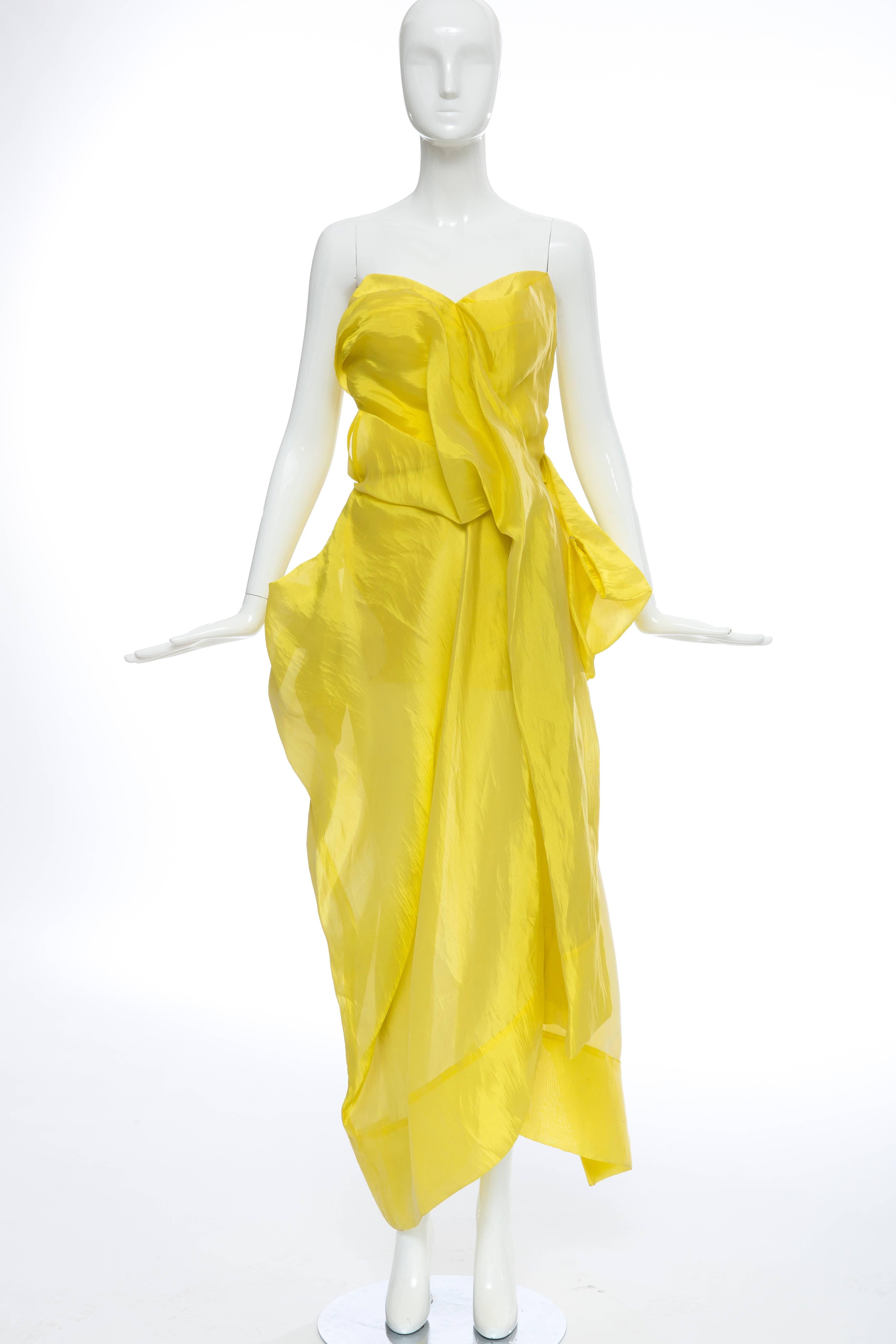 Yohji Yamamoto, Spring-Summer 1997, draped yellow strapless silk dress with side snap closure.

The dress was exhibited at the V&A 
