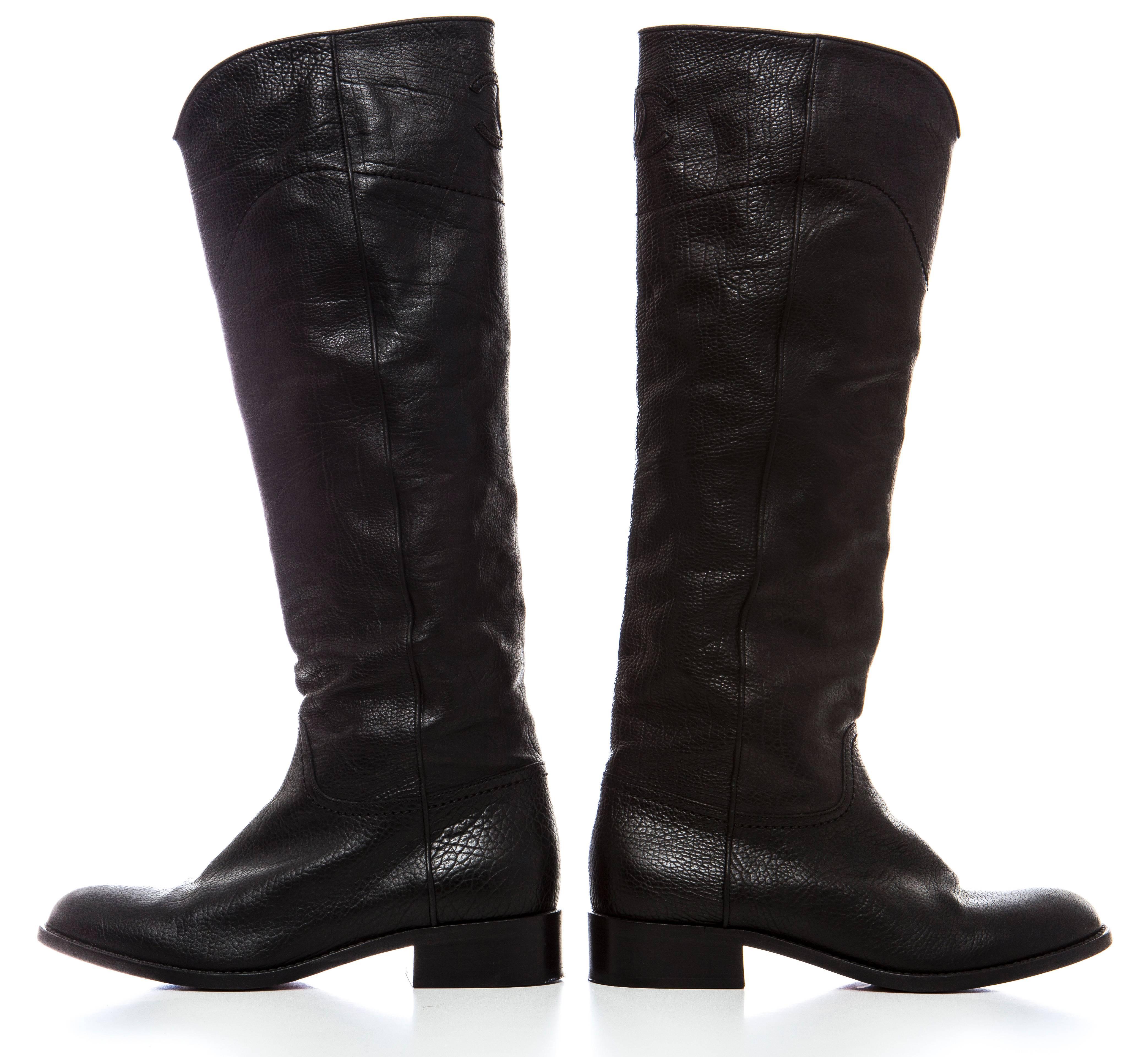 Chanel tall black leather boots with CC detail on back.

EU. 38
US. 8