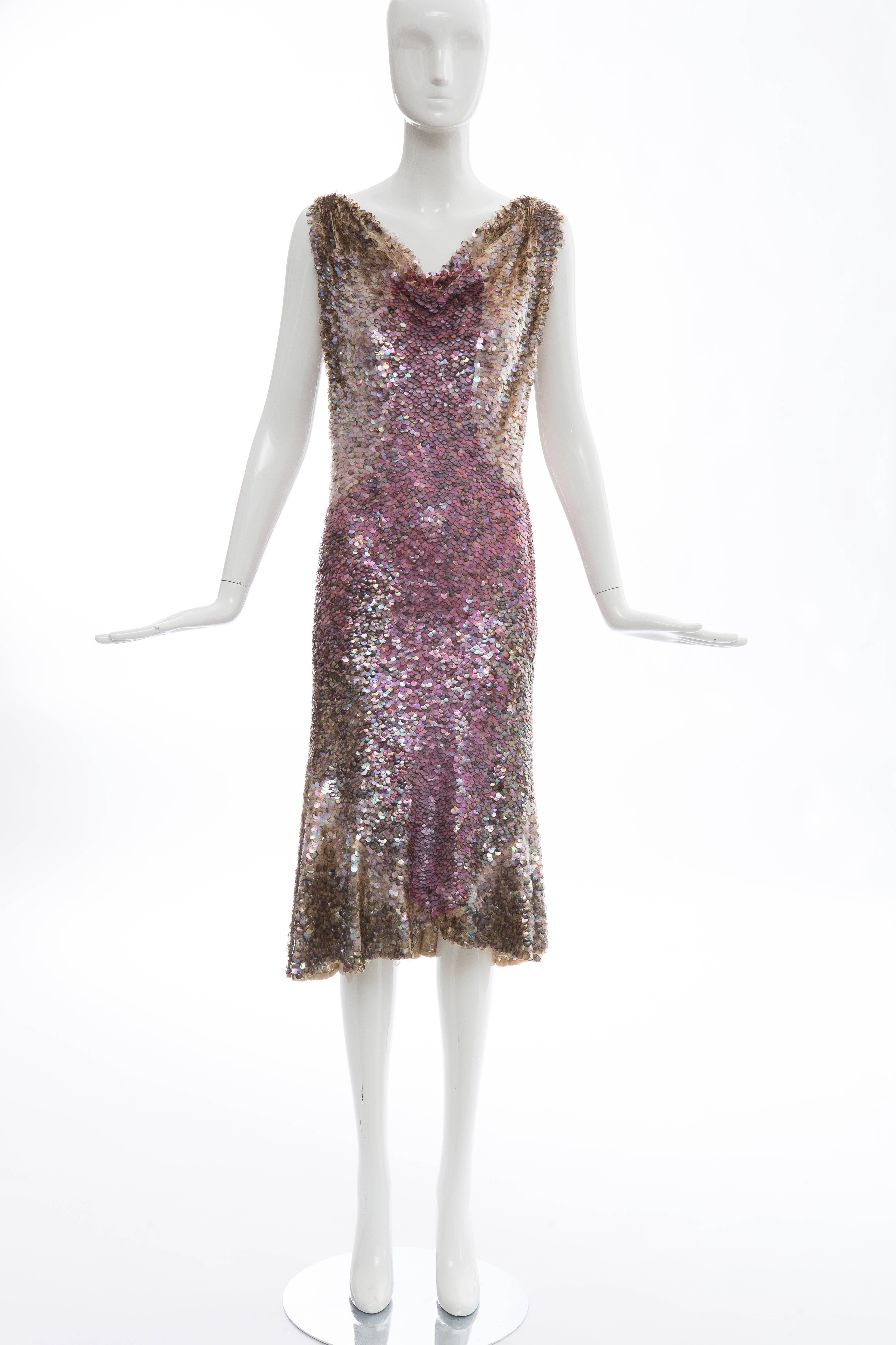 Zac Posen, Spring - Summer 2004 Runway sleeveless dress with paillettes, flounce hem, V-back and fully lined.

US. 8 but fits a 6

Bust: 30, Waist 28, Hips 34, Length 43.5

