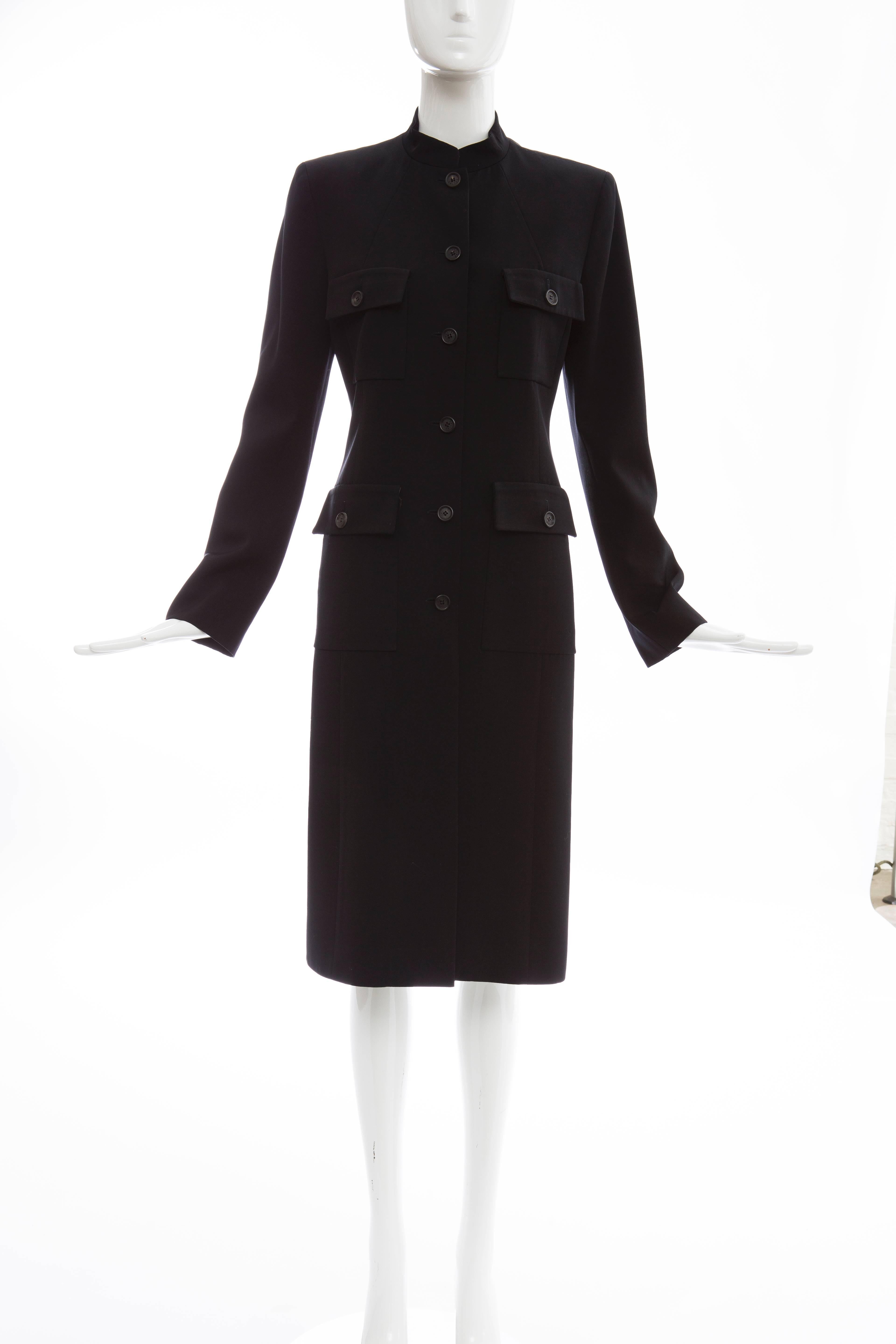 Celine black lightweight wool gabardine button front coat, four button front pockets and fully lined.

EU. 38
US. 6