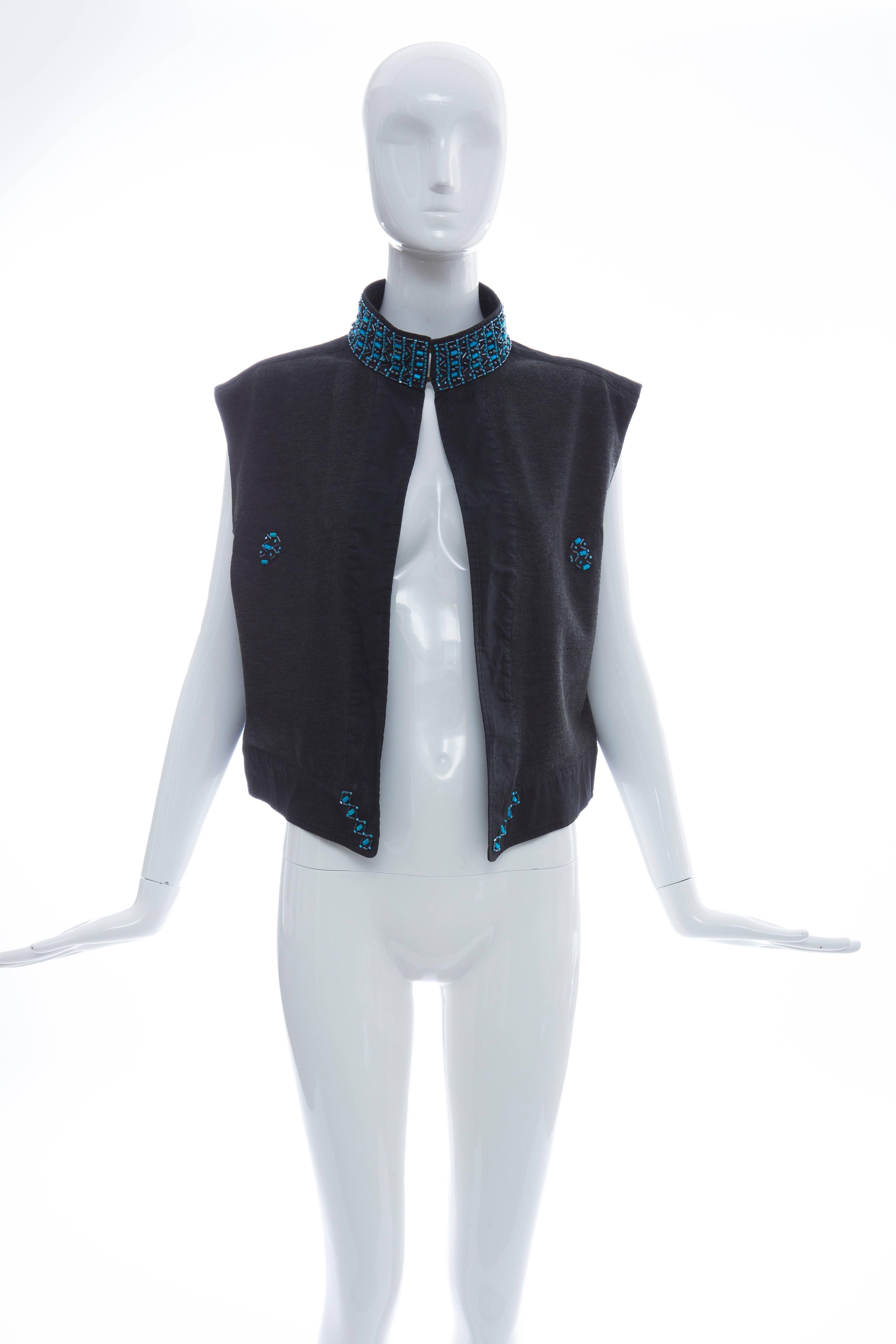 John Bartlett, Spring - Summer 2000, men's wool acrylic nylon charcoal grey vest with  black waxed cotton trim and turquoise jewel collar with hidden metal clasp.

IT. 50

Bust 42, Waist 41, Length 23