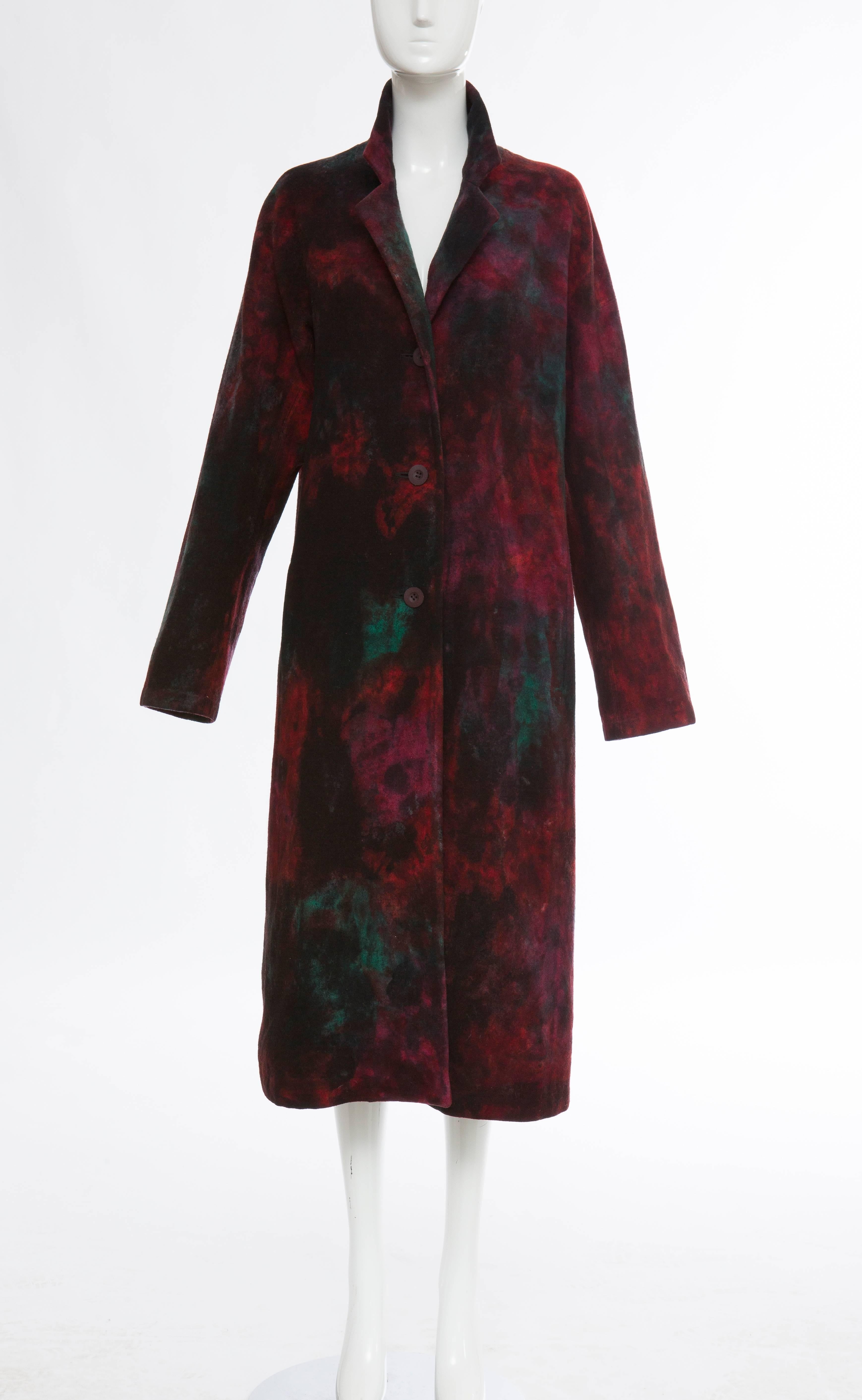 Issey Miyake, circa 1990's, tie die wool felt button front coat with notch collar, two inset front pockets and fully lined in silk.

Bust 40, Waist 41, Hips 46, Length 49