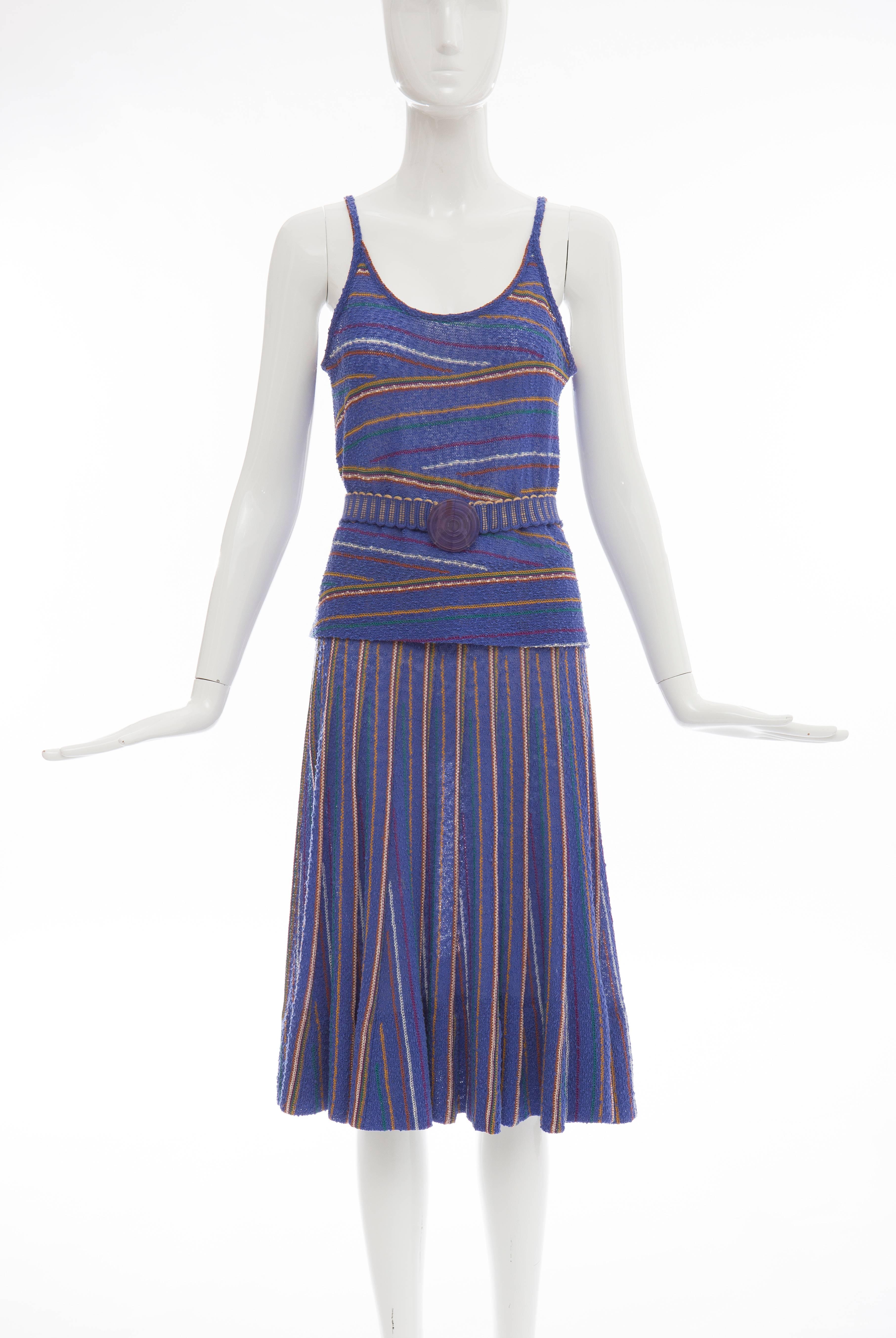 Missoni,  made in Italy for Bonwit Teller, circa 1970's, wool nylon and linen skirt suit, elastic waist with knit belt and deco buckle marked Missoni.

IT. Medium
Skirt: IT. 44

US. 8

Waist: 26 inch up to 32, Bust 36, 
Skirt Length 25inch 
Knit