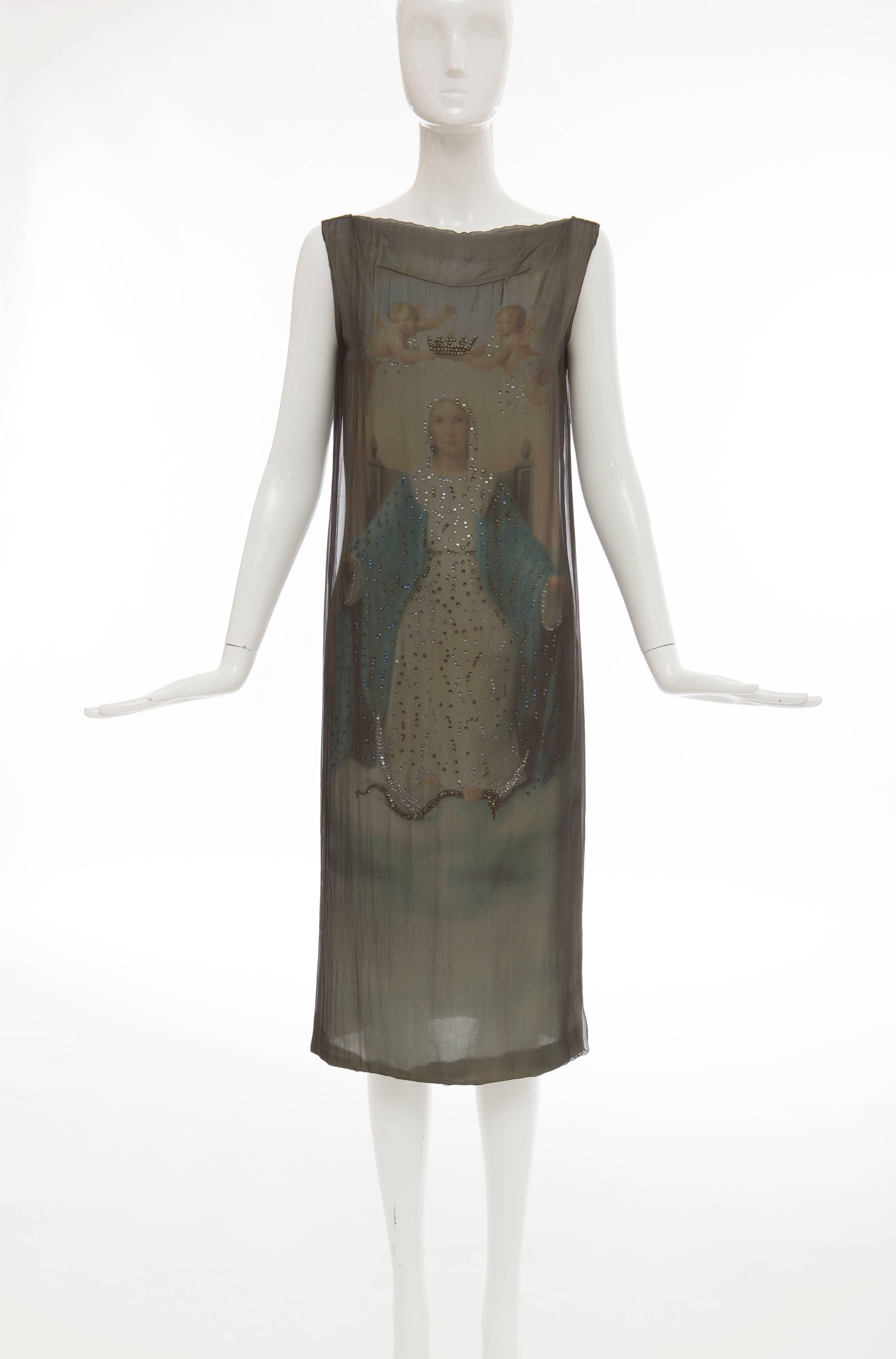 Dolce & Gabbana, Stromboli Collection, Spring-Summer 1998 silk chiffon sleeveless shift dress with Virgin Mary print underlay, diamanté detail with back zip.

IT. 40
US. 4

Bust: 36
Waist: 34
Hip: 36
Length: 45