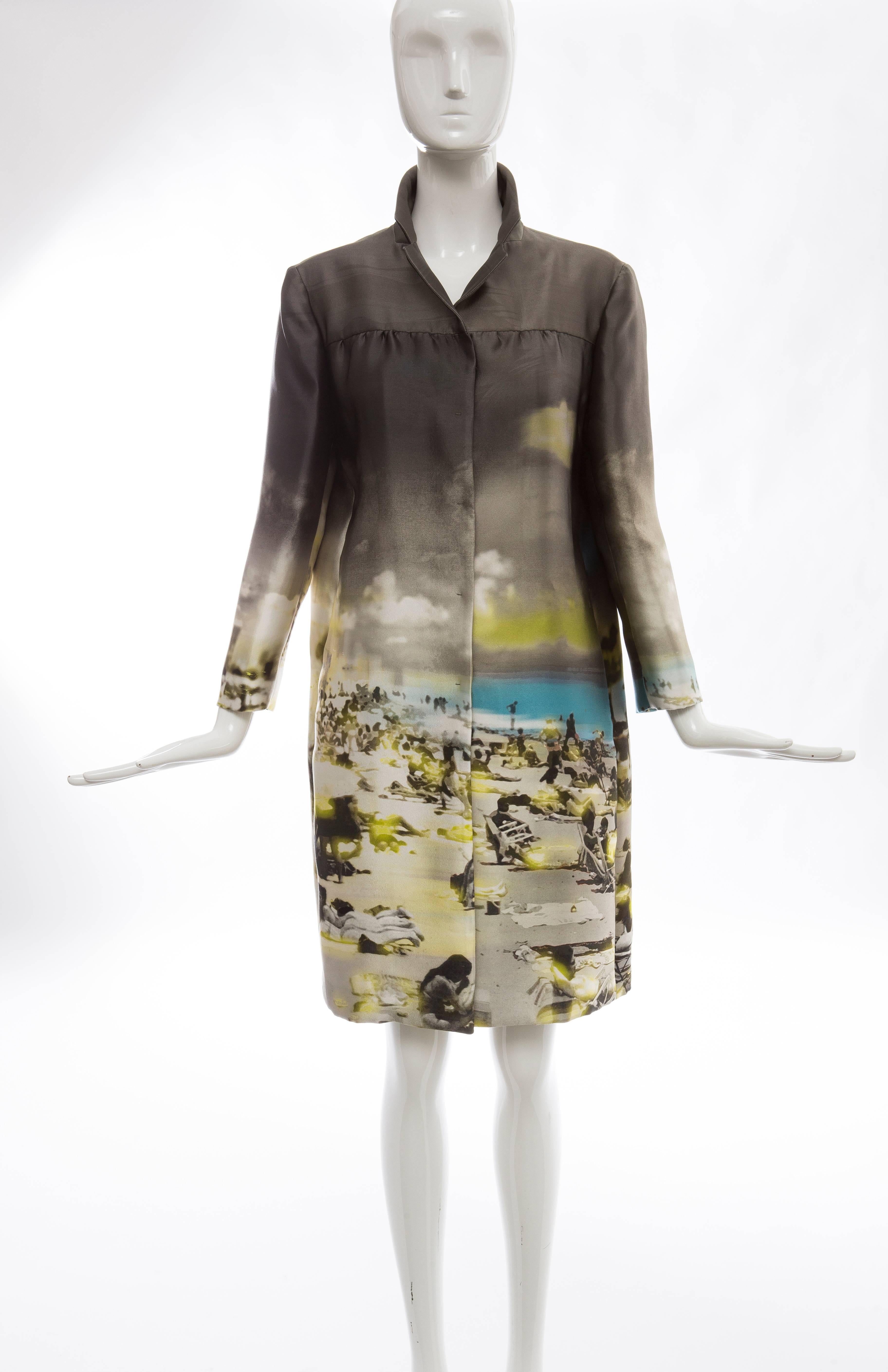 Prada, Spring 2010 silk/polyester, printed coat with two front pockets, snap front and fully lined.

Bust 38”, Waist 38”, Shoulder 16.5”, Length 37”

EU. size 44 - US. size 8