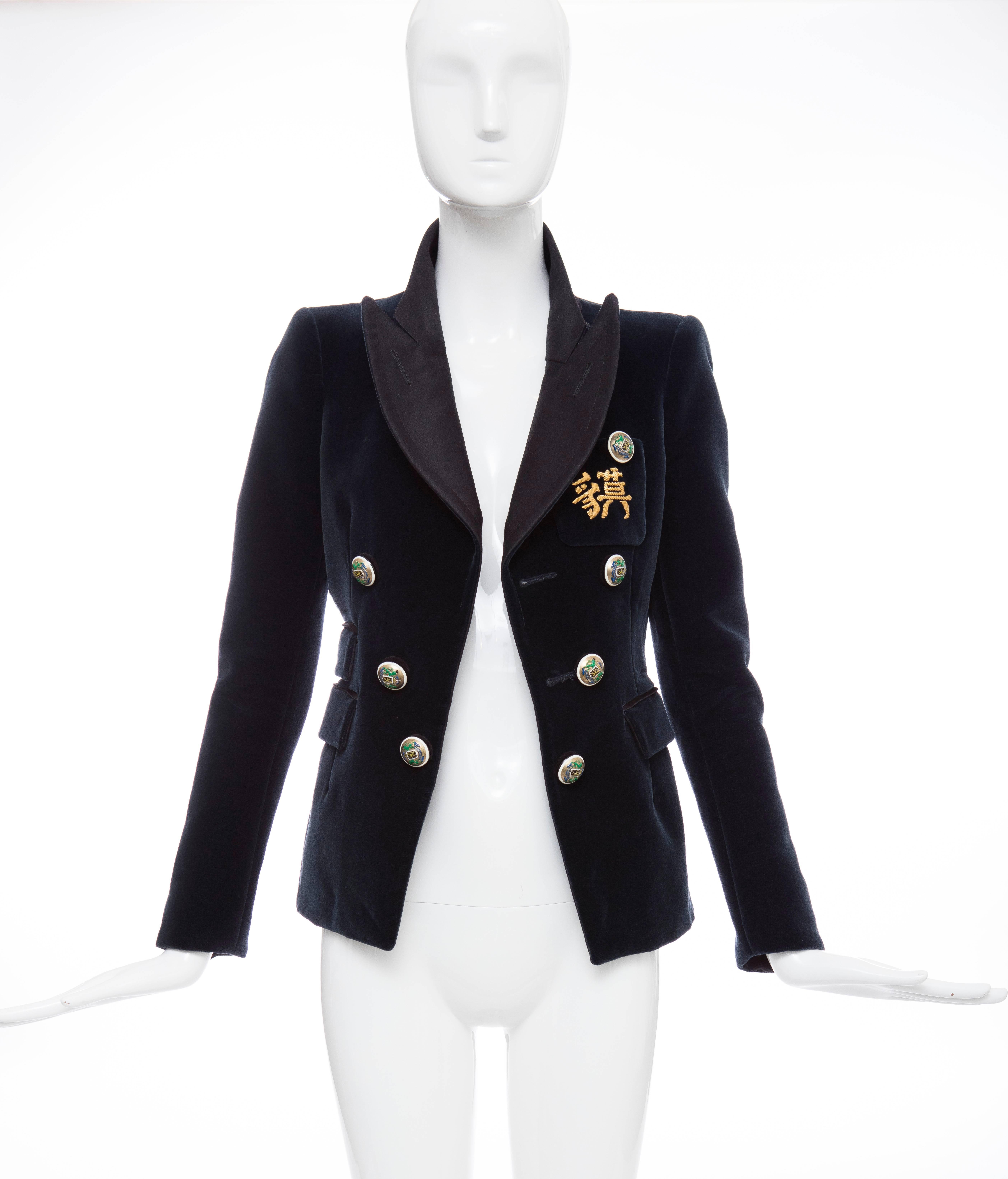 Nicolas Ghesquière for Balenciaga, Autumn-Winter 2007 navy cotton velvet blazer featuring notched lapels, three flap pockets, embroidered patch pocket at bust, engraved button closures at front and fully lined in silk.

FR. 36
US. 4

Bust 34, Waist