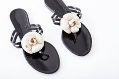 Chanel Black Jelly Slide Sandals With Cream Camellia