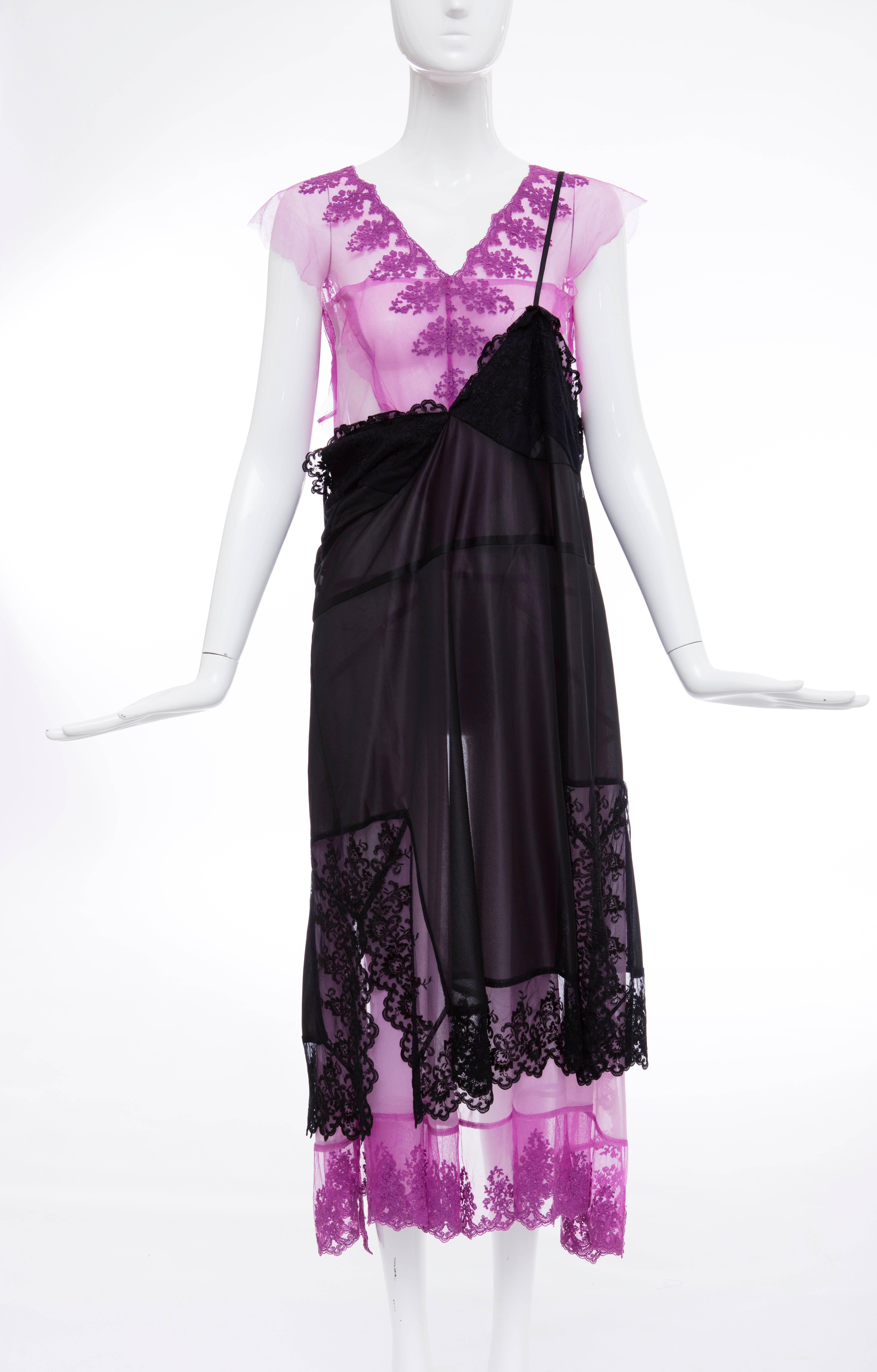A Comme des Garcons 'lingerie' dress, 'Beyond Taboo', Autumn-Winter, 2001 collection, ribbon label and size S, the embroidered purple nylon 'negligee' worn under a black nylon slip panel with large elastic bra strap to fasten.

This design appeared