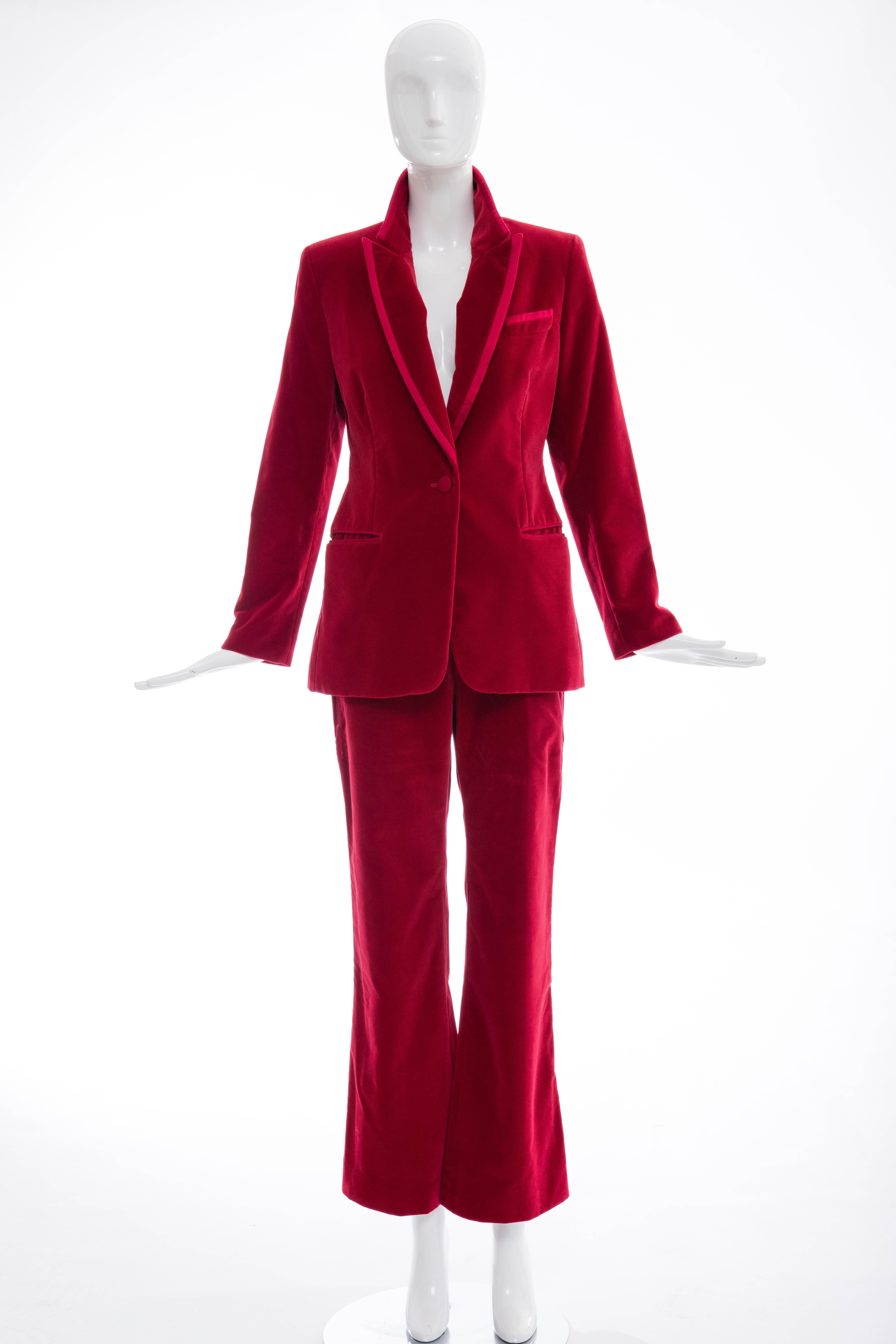 Tom Ford for Gucci, Autumn-Winter 1996, red cotton velvet pantsuit. Jacket features dual welt pockets at waist, slit pocket at bust, contrast panel at collar and single button closure at front. Pants feature dual slit pockets at waist, dual welt