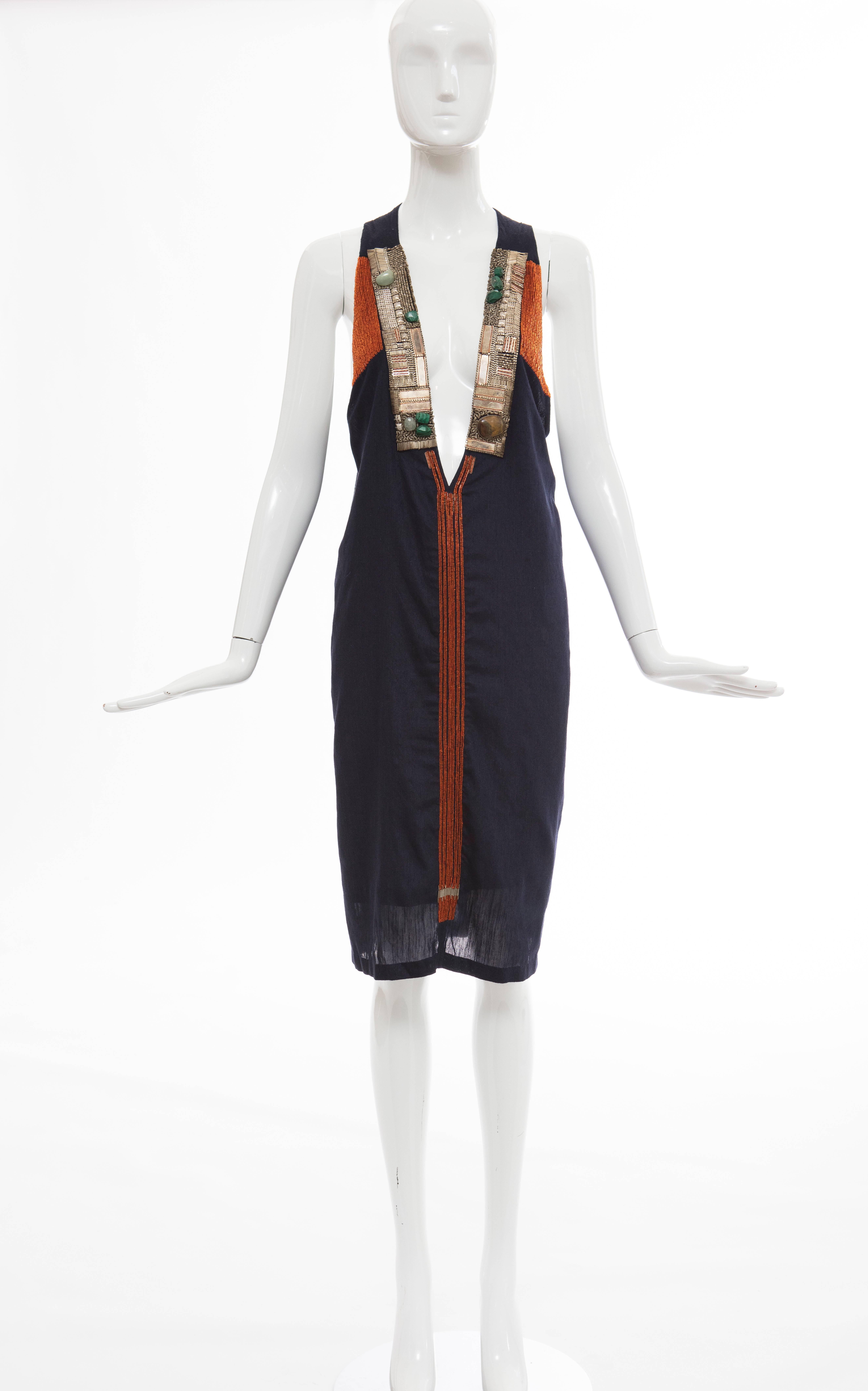 Dries Van Noten, Spring-Summer 2008 navy sleeveless silk linen cotton dress with V-neck, bead and stone embellishments throughout.

FR. 38
US. 6

Bust 40, Waist 42, Hip 46, Length 40
