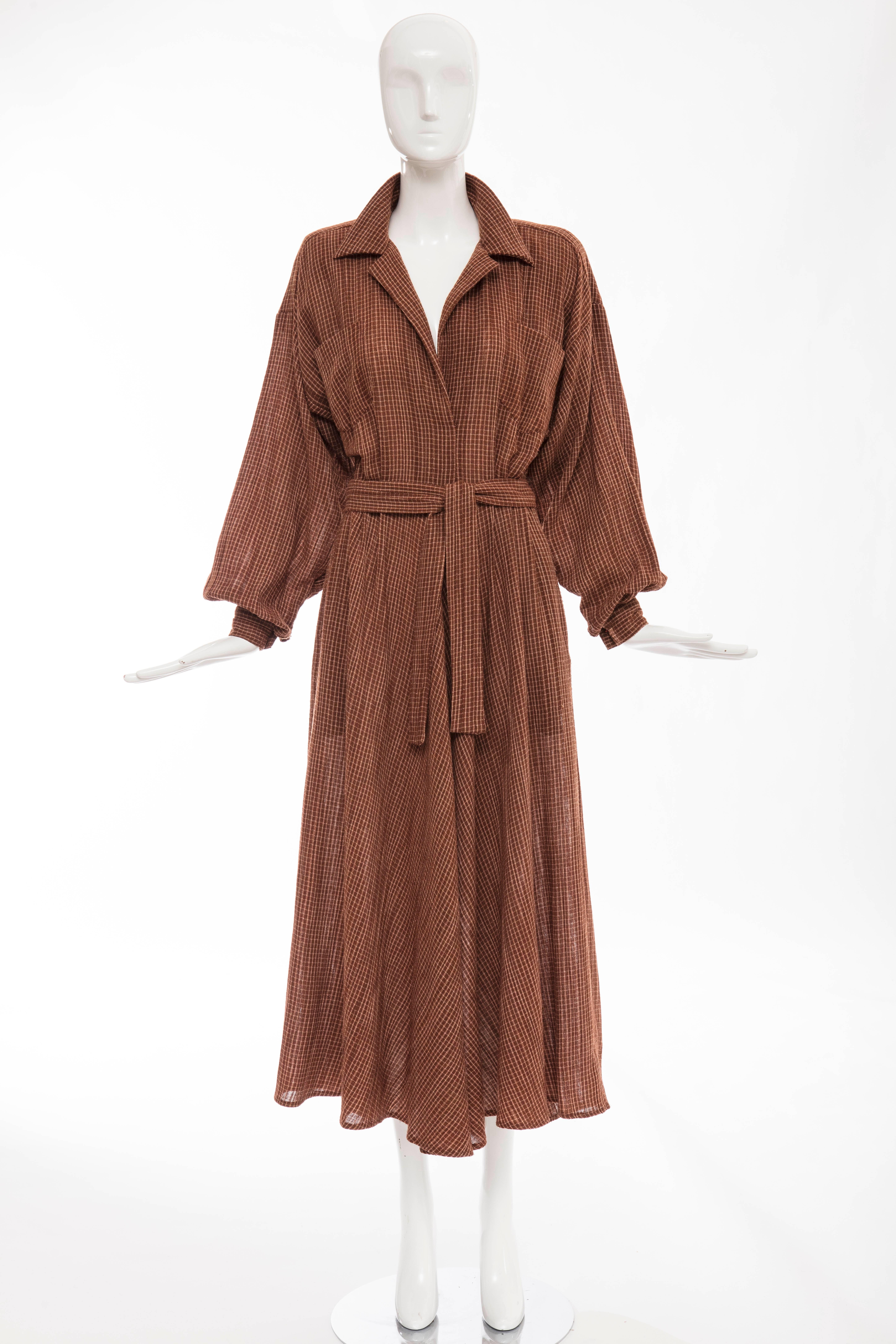 Norma Kamali, circa 1980's terracotta cotton gauze windowpane check dress, removable velcro shoulder pads, two front pockets with self belt and side zip.

US. 6

Bust 36, Waist 25, Hips 56, Length 51