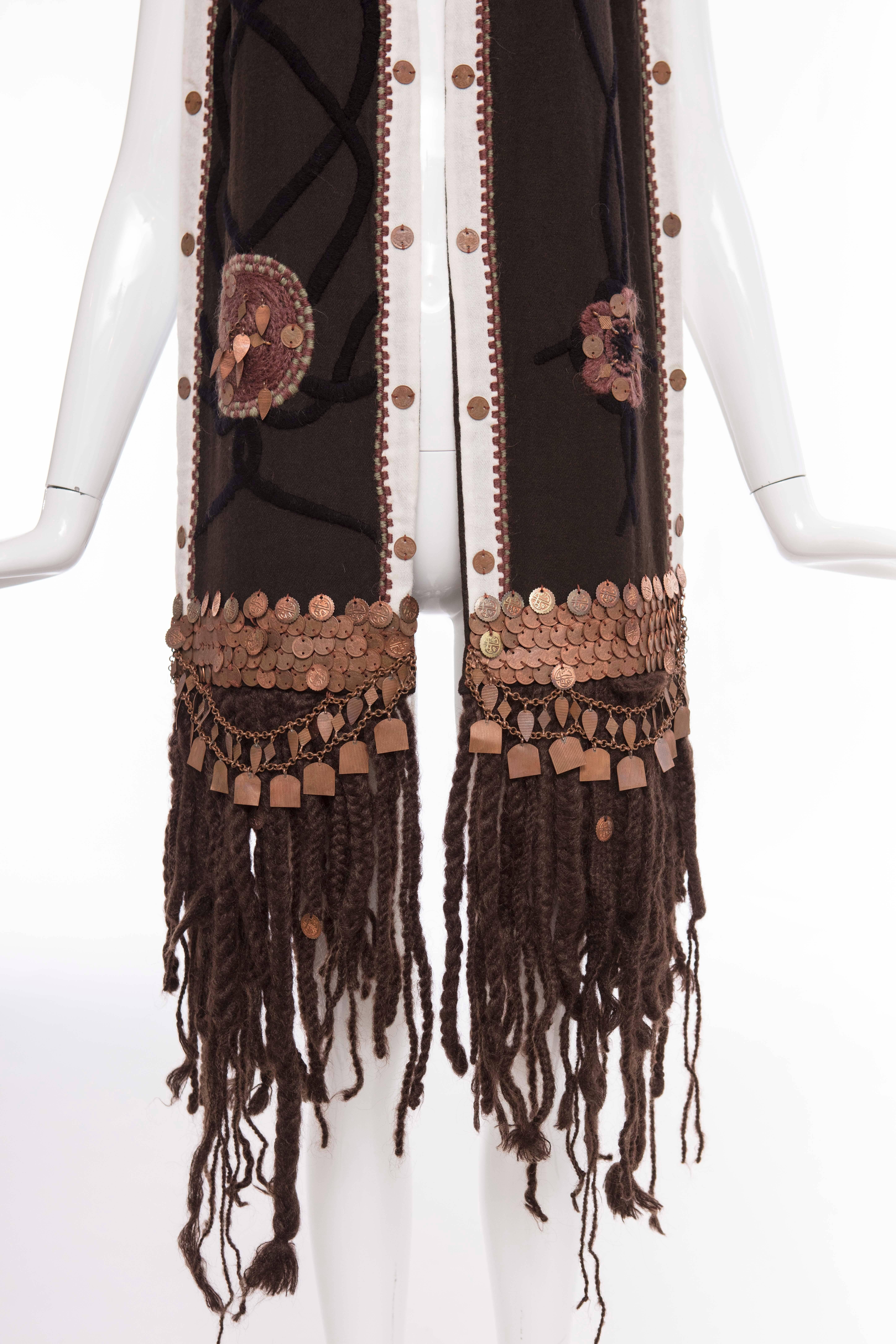 Dries Van Noten, Autumn-Winter 2002, embroidered scarf with antiqued copper-coin embellishments throughout and long braided fringe-trim at ends.

Length 80, Width 10