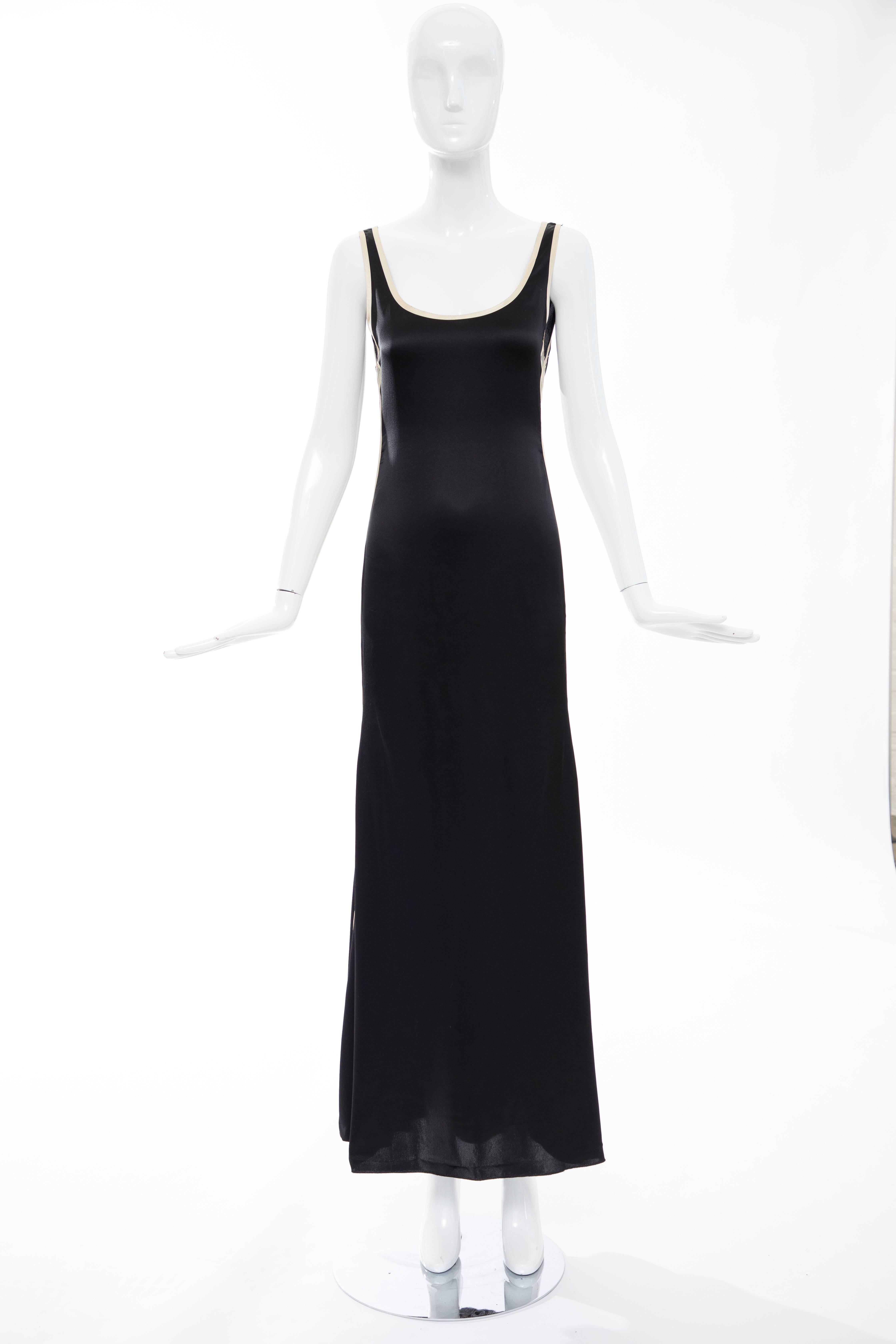 Jean Paul Gaultier, Spring-Summer 2007 silk embroidered evening dress with scoop neckline, contrast piping throughout, mesh trim at sides and low cut back.

US. 6

Bust: 33, Waist 28, Hips 34, Length 58
