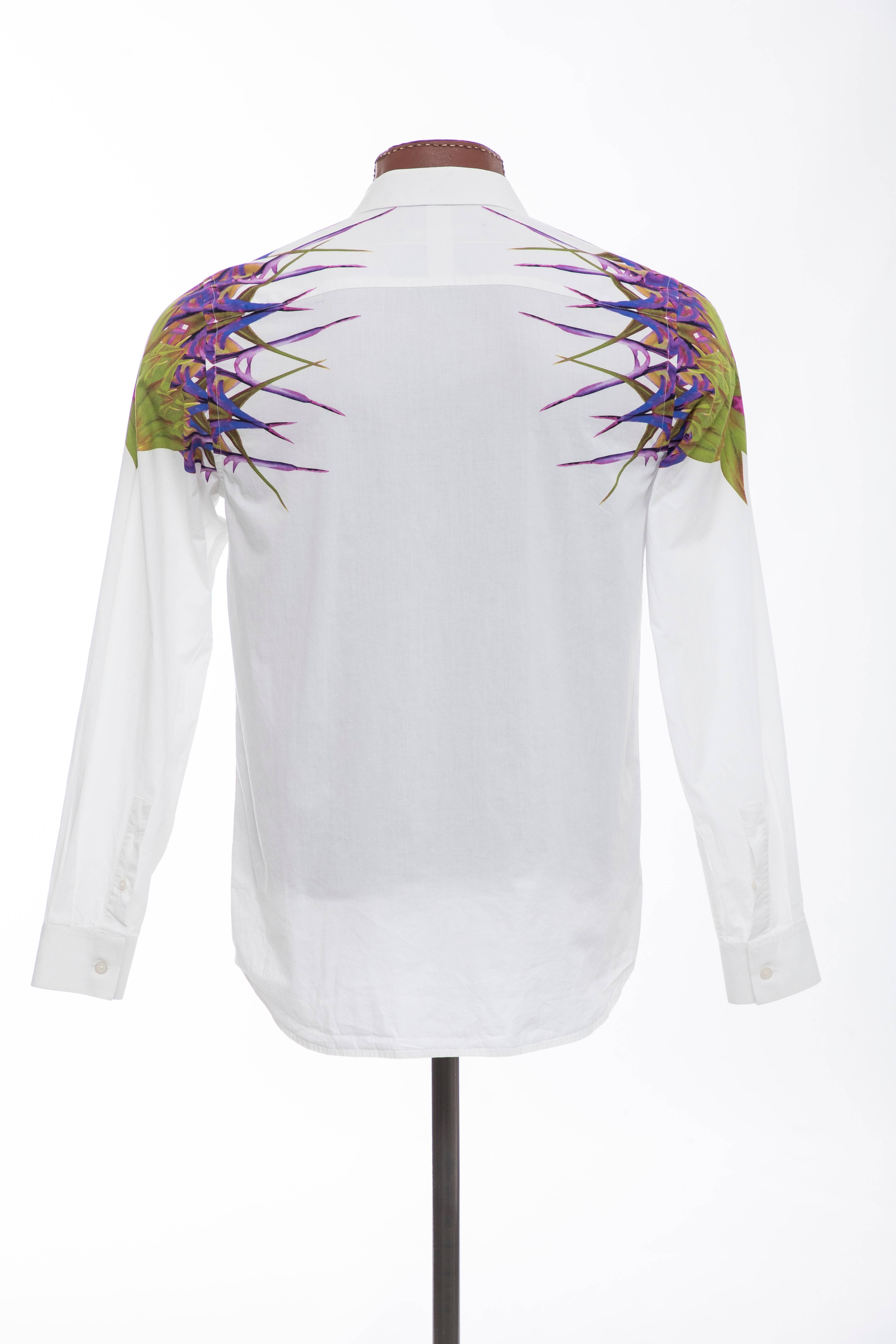 Riccardo Tisci for Givenchy, Spring-Summer 2012 men's white cotton button front shirt with birds of paradise print at shoulders, point collar, single button barrel cuffs and signature T-dart at back. Includes additional buttons.

Size: