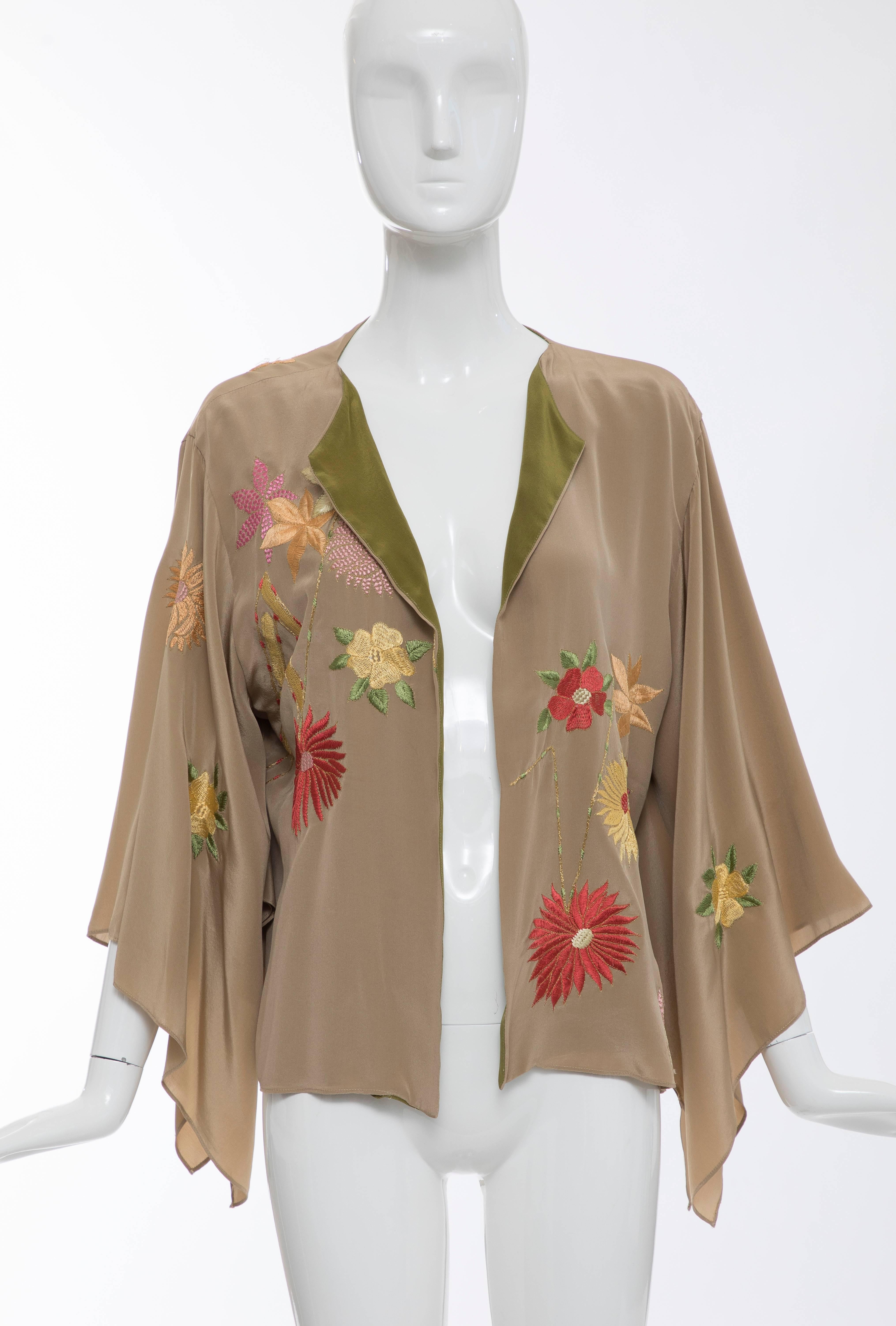 Natori, Spring-Summer 2005 silk floral embroidered kimono jacket with silk olive green lining.

One Size

Bust 42, Waist 42, Length 23.5