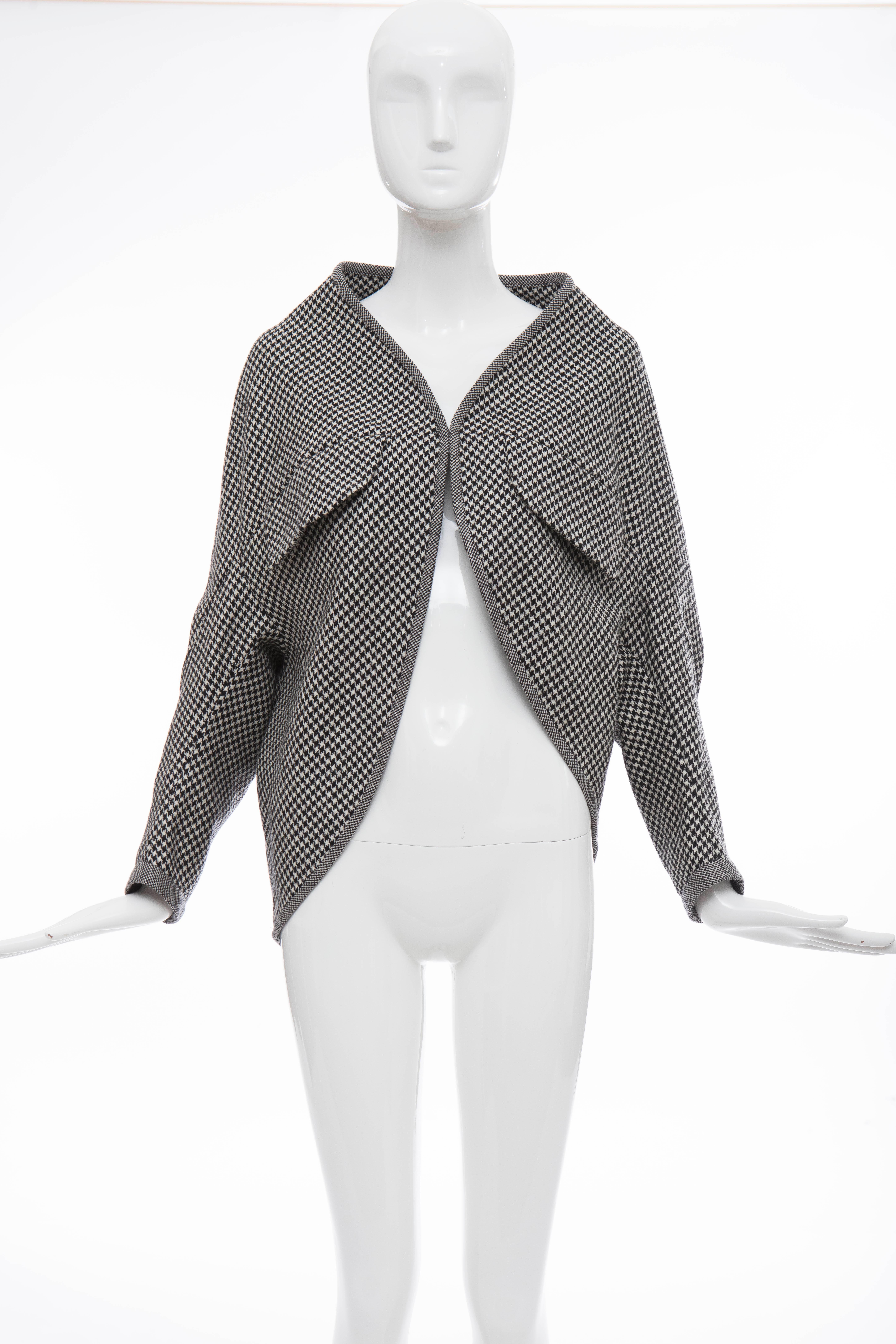 Yohji Yamanoto, Autumn-Winter 2003 wool jacket with houndstooth pattern throughout, shawl collar, dual flap pocket at bust and hook-and-eye closure at front. 

Japan: 2
US. Medium

Bust: 53, Waist 51, Shoulder 18.5, Length 25, Sleeve 8
