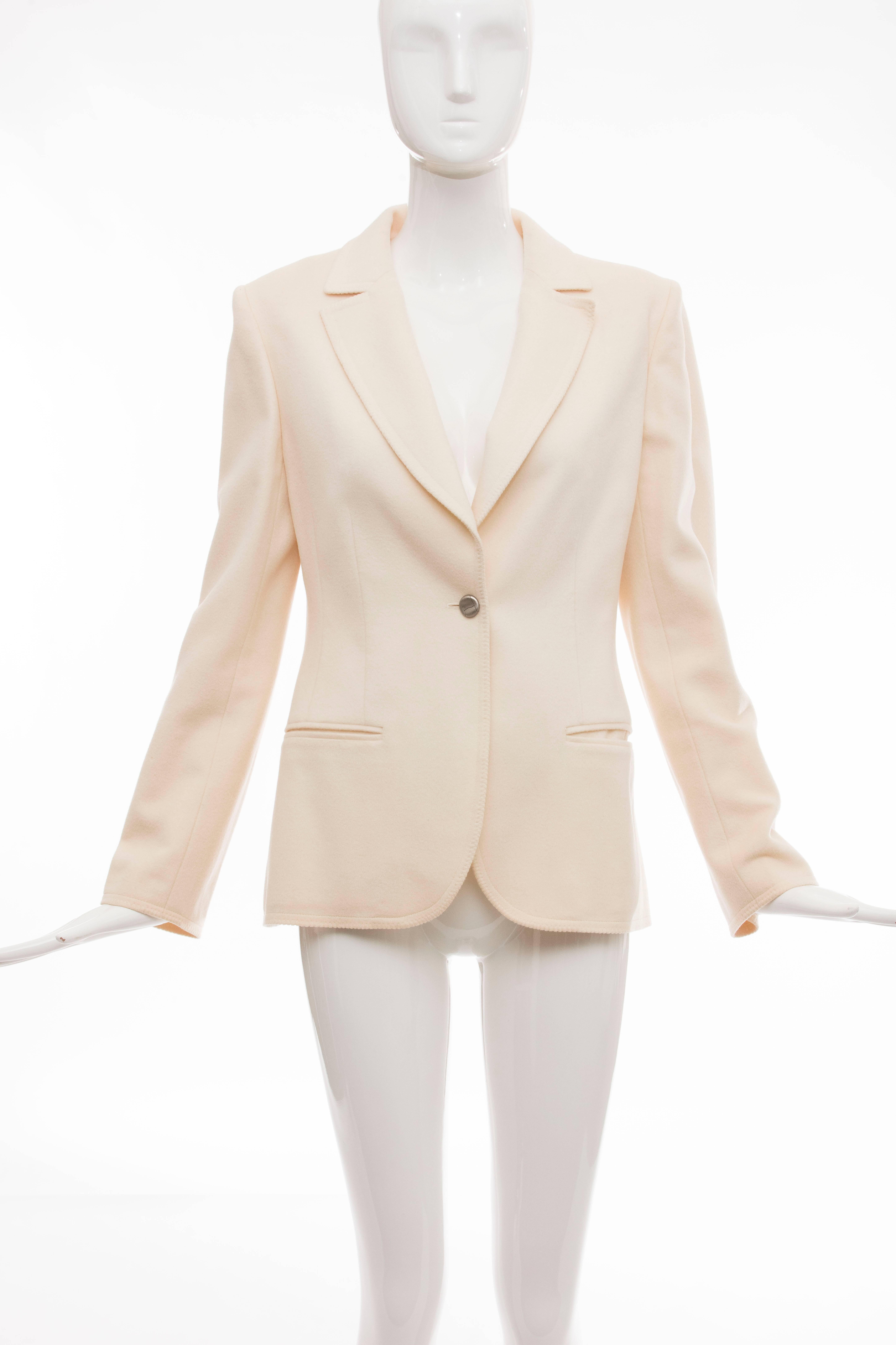 Chanel, Pre-Fall 1998 cream wool button front jacket, two front pockets and fully lined in signature CC silk.

EU. 42

Bust 34, Waist 32, Sleeve 24, Length 27